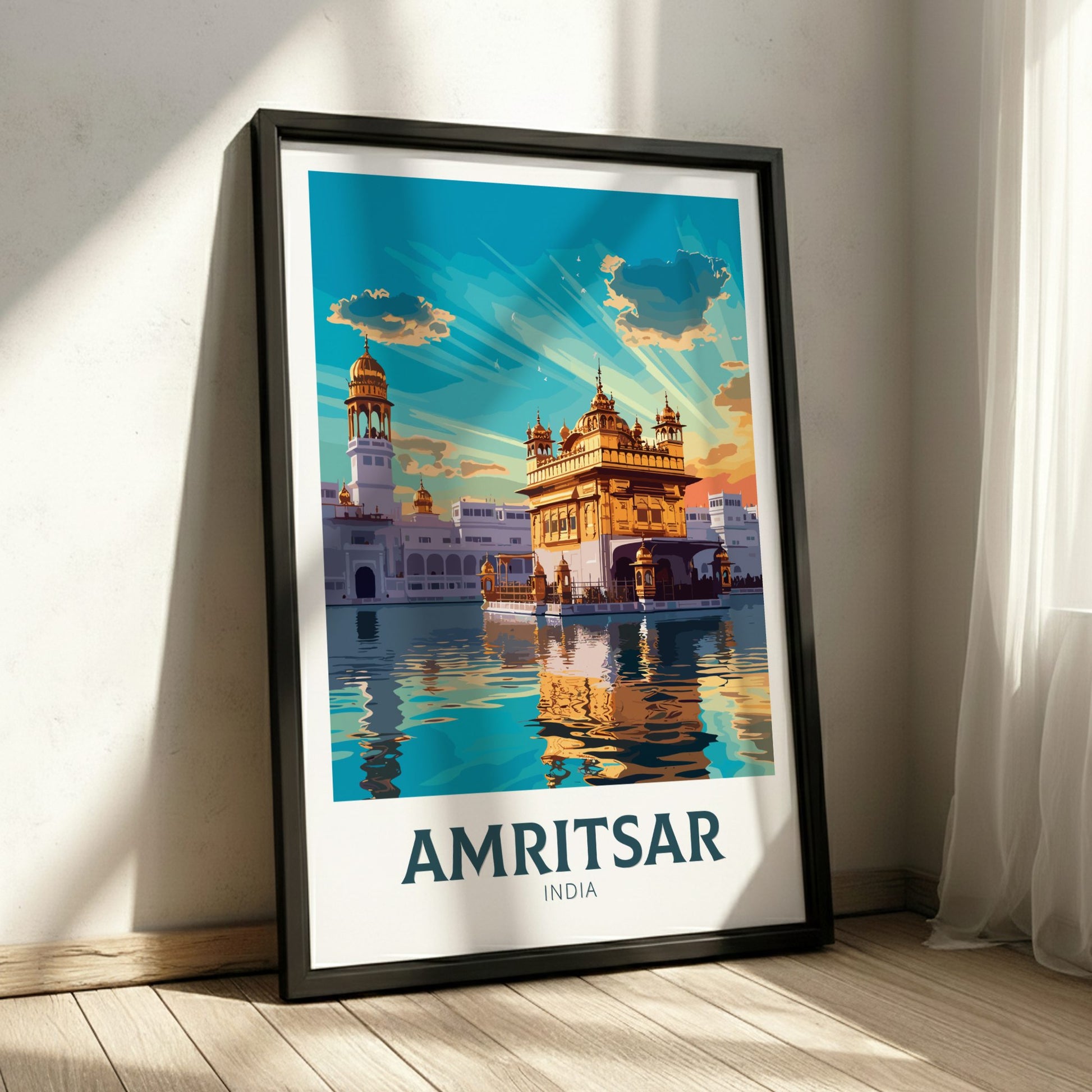 Framed poster of Amritsar with a temple image on a white wall.