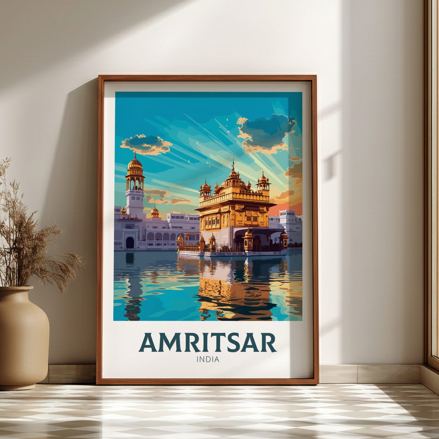 Framed poster of Amritsar, India with a temple design on a wall.