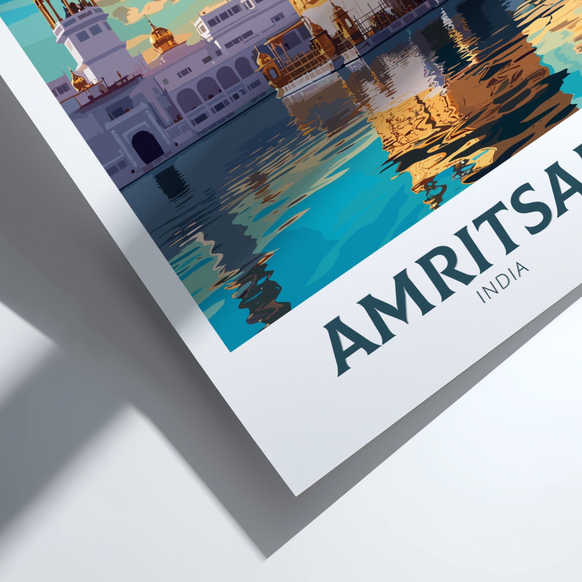 Framed artwork of Amritsar, India with architectural reflection on water.