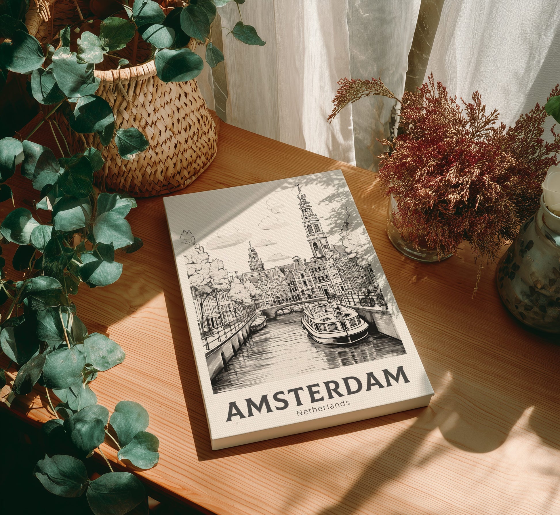 canvas of 'Amsterdam' on a wooden table with plants