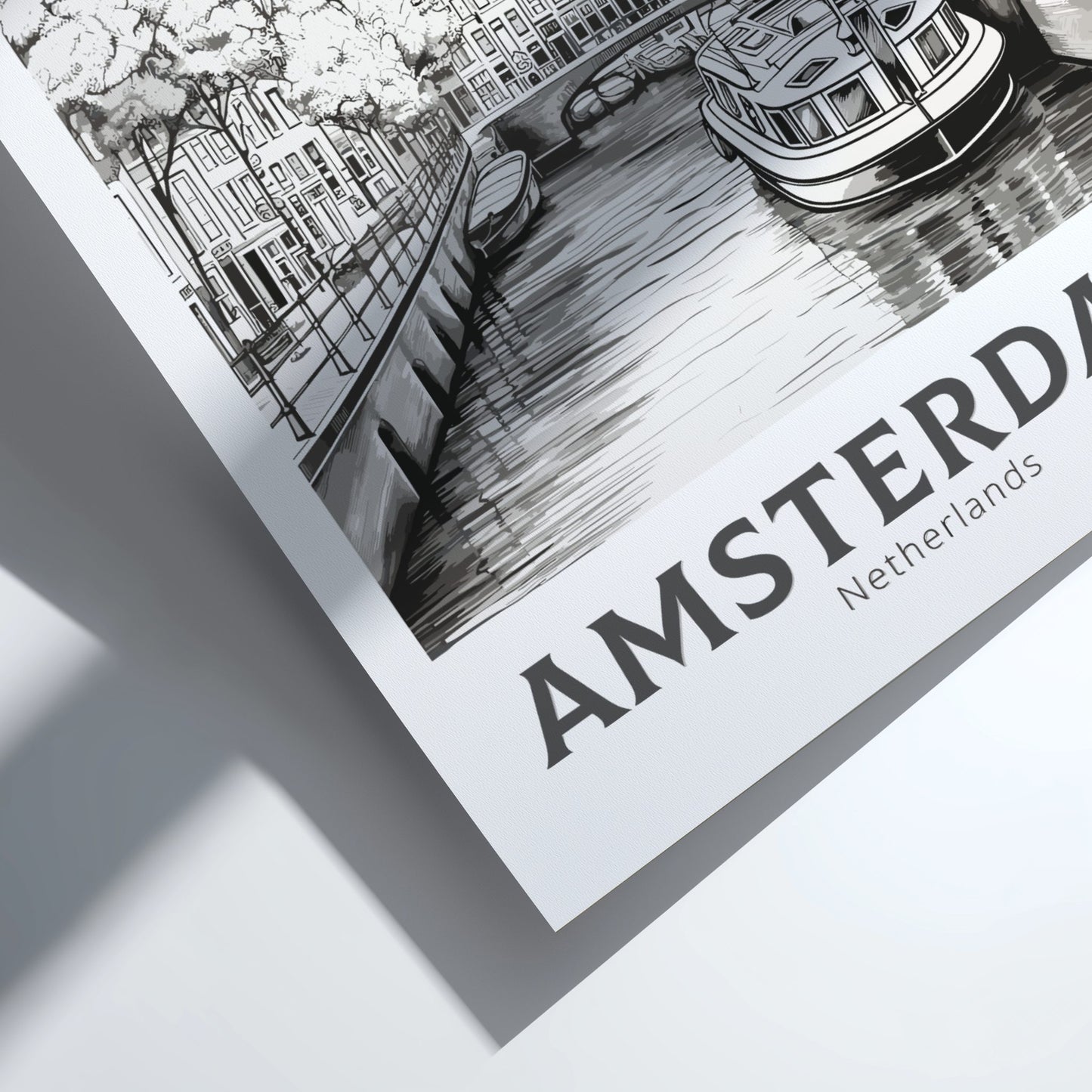 Framed black and white illustration of Amsterdam with a canal scene.