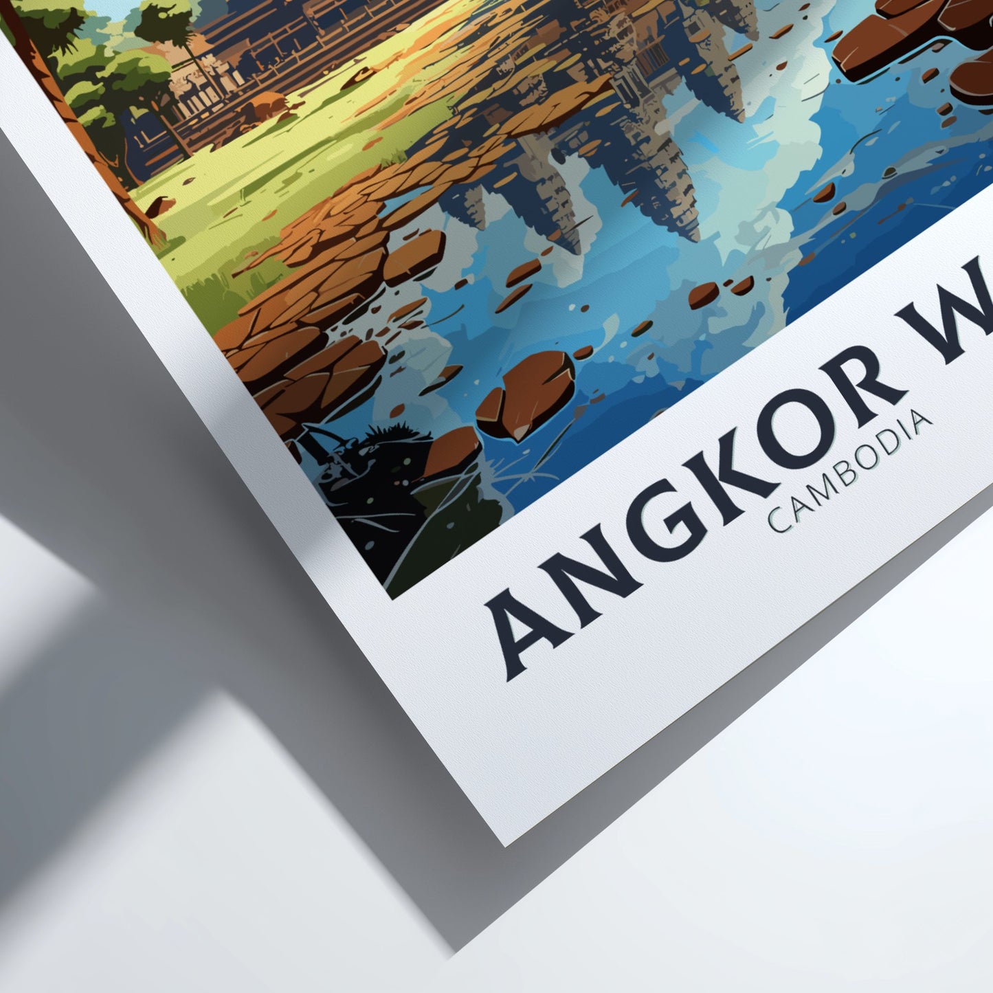 Framed artwork of Angkor Wat with water reflection on a white background
