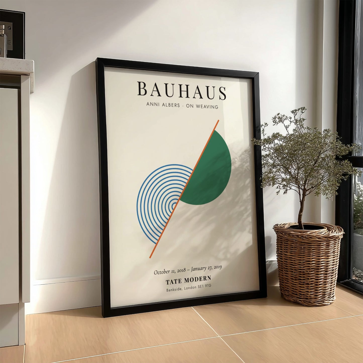 Bauhaus poster featuring Anni Albers' weaving art with geometric shapes and soothing colors.
