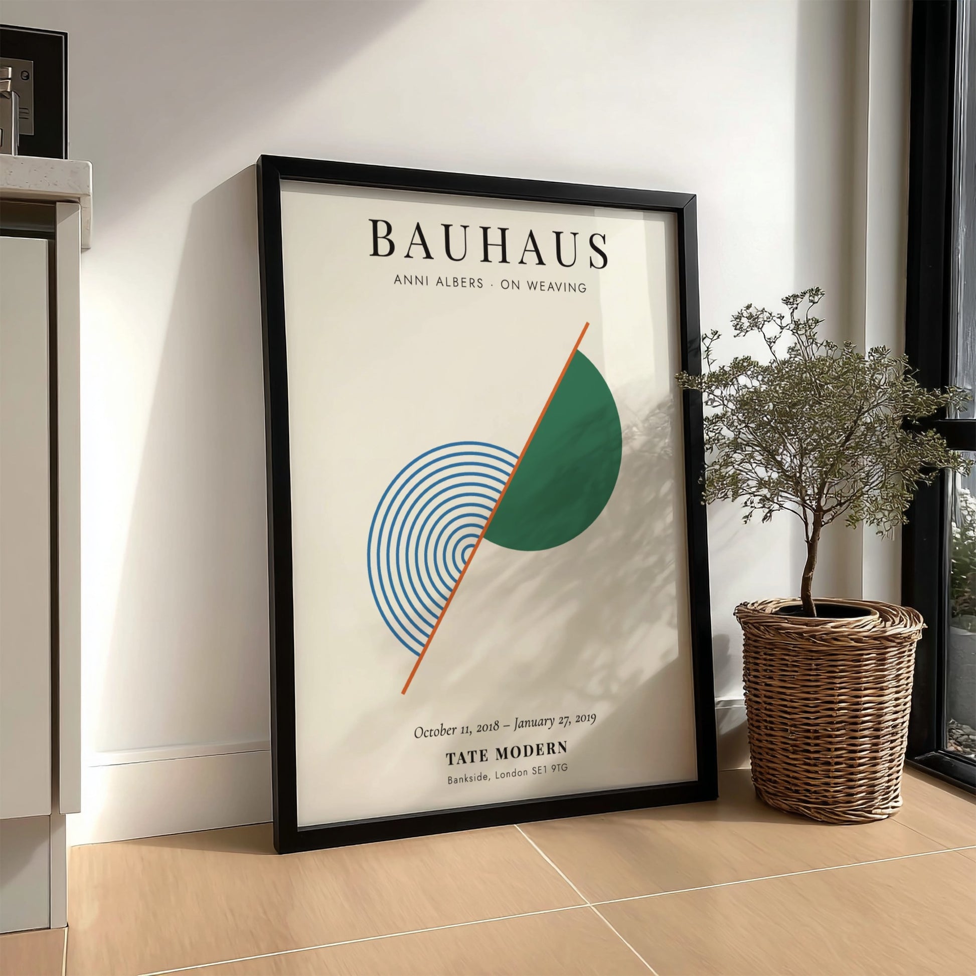 Bauhaus poster featuring Anni Albers' weaving art with geometric shapes and soothing colors.