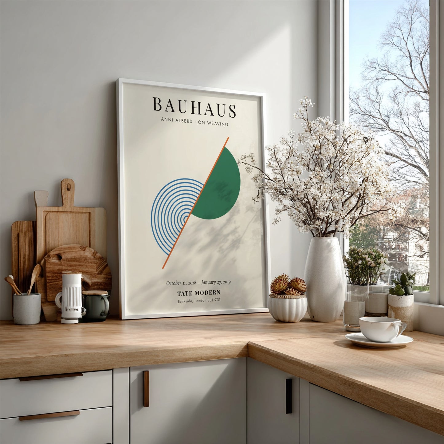 Bauhaus poster featuring Anni Albers' weaving art with geometric shapes and soothing colors.