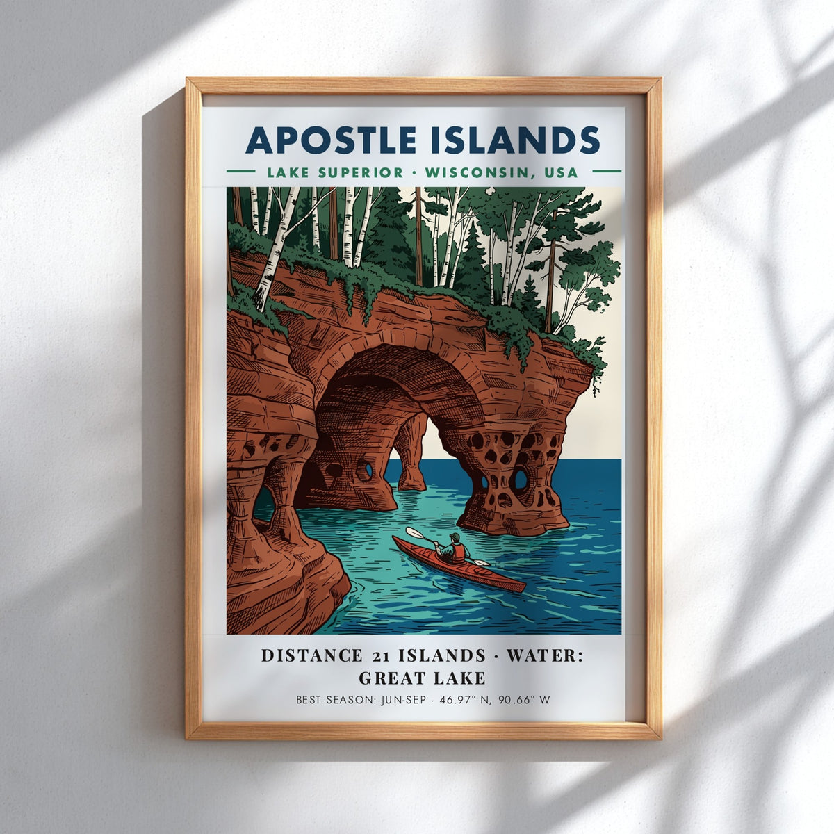 Poster featuring a kayaker paddling through sandstone sea caves at Apostle Islands Wisconsin