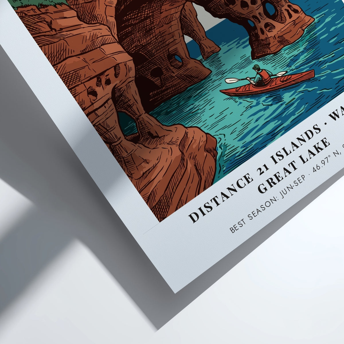 Poster featuring a kayaker paddling through sandstone sea caves at Apostle Islands Wisconsin