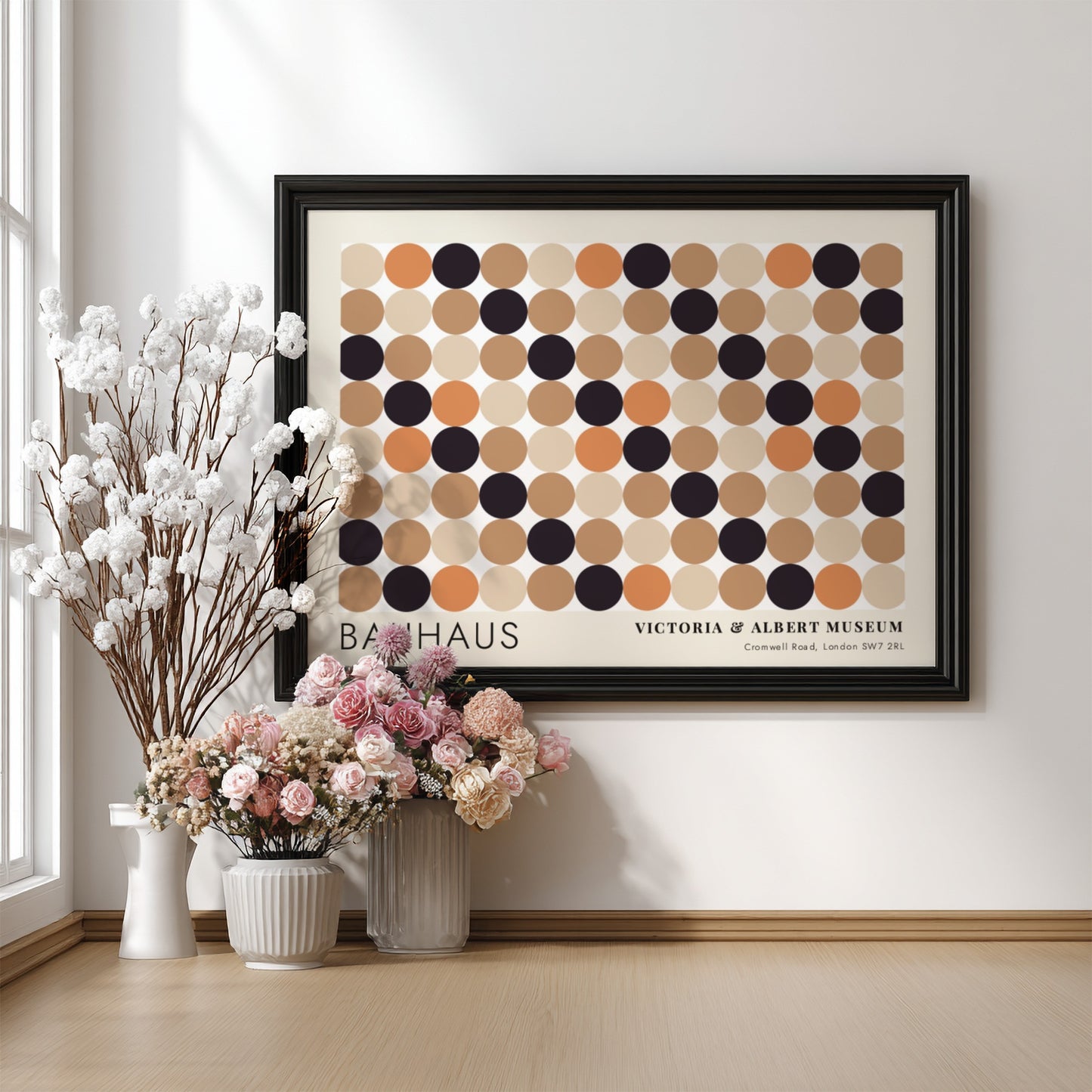 Wall art poster featuring a geometric Bauhaus grid of tan, orange, and black circles.