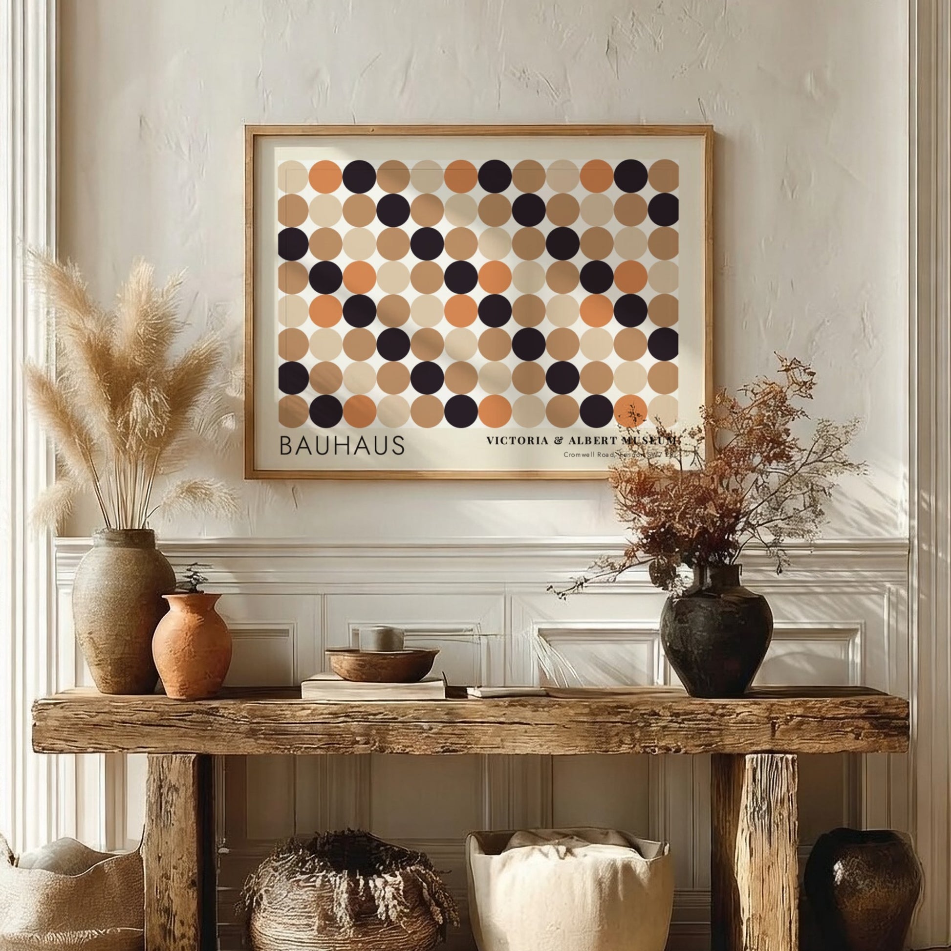Wall art poster featuring a geometric Bauhaus grid of tan, orange, and black circles.