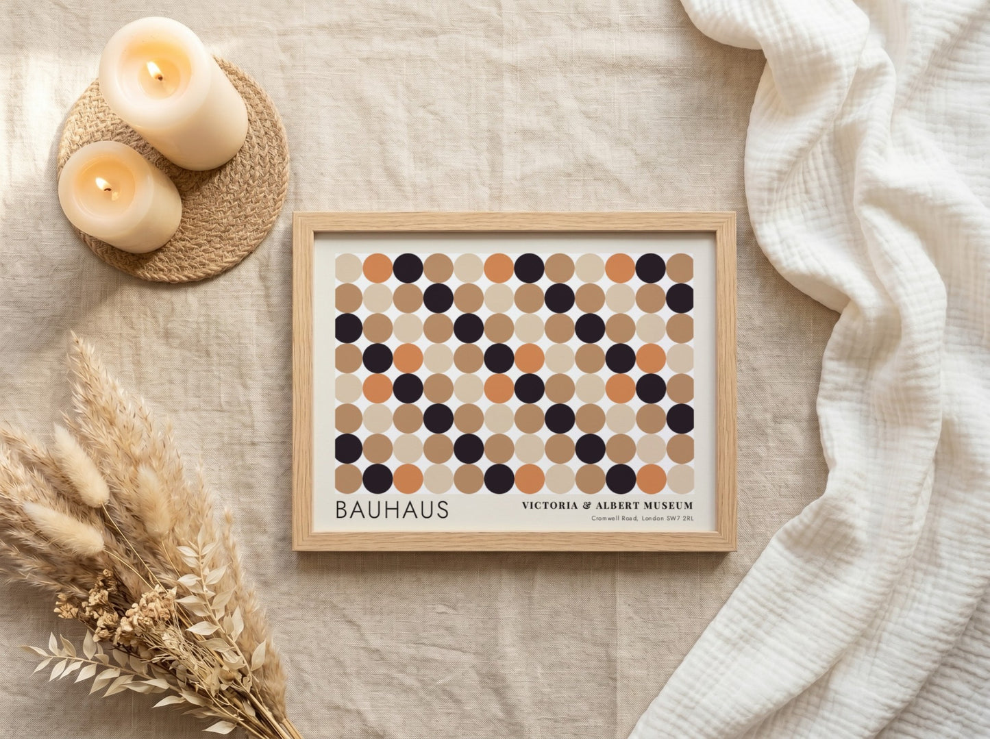 Wall art poster featuring a geometric Bauhaus grid of tan, orange, and black circles.