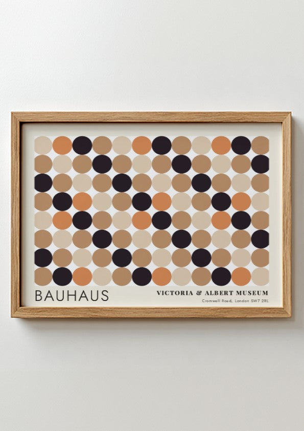 Wall art poster featuring a geometric Bauhaus grid of tan, orange, and black circles.