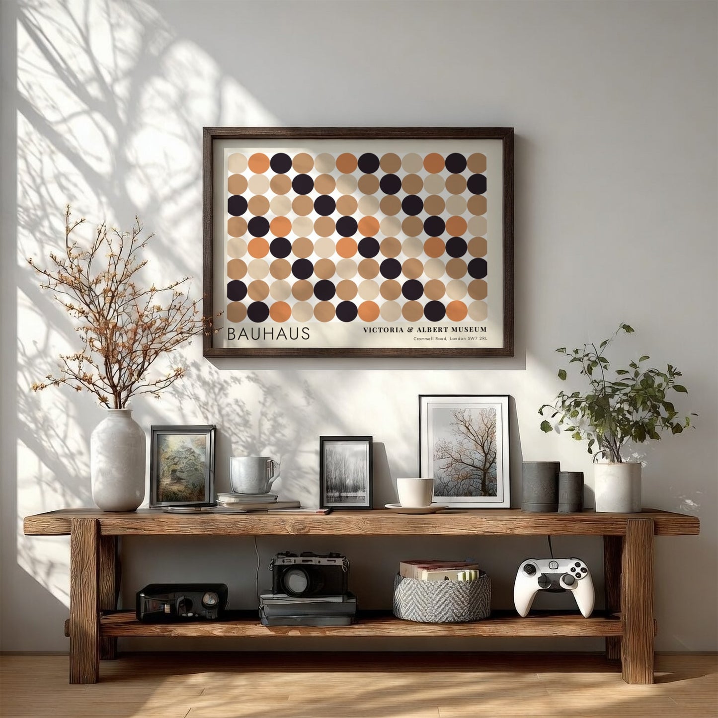 Wall art poster featuring a geometric Bauhaus grid of tan, orange, and black circles.