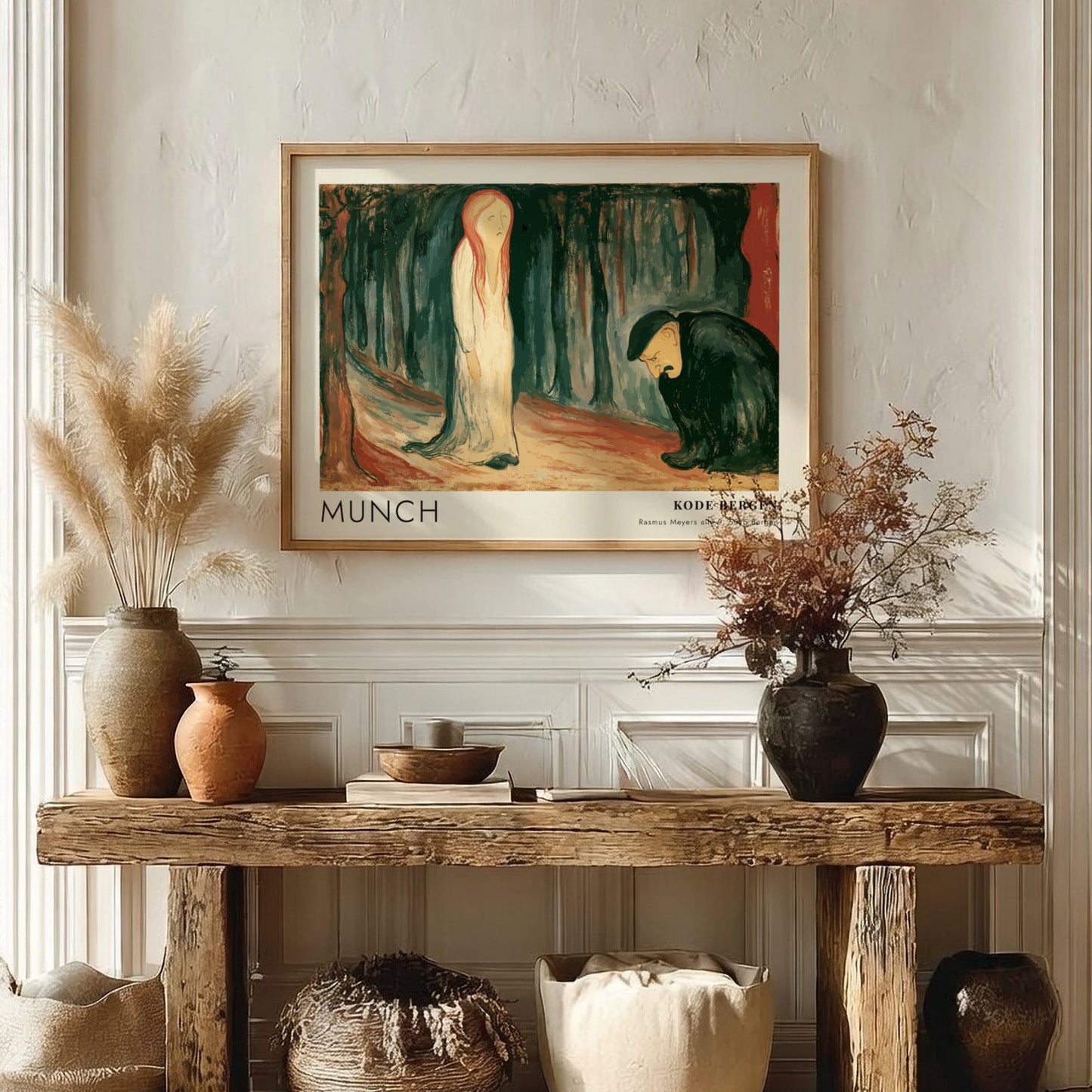 Exhibition poster featuring Edvard Munch's Ashes painting in a light wooden frame hanging