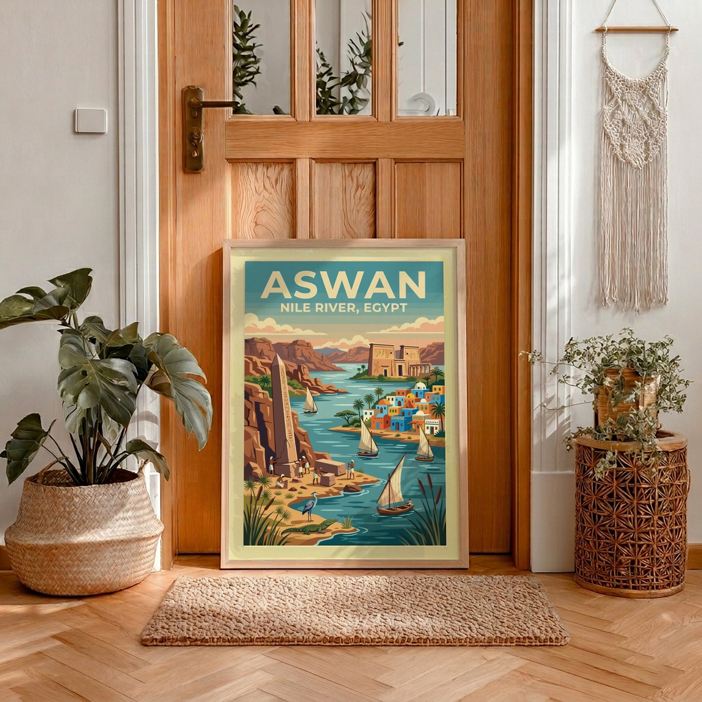 Travel poster of Aswan Egypt featuring the Nile River, ancient obelisks, and sailboats.