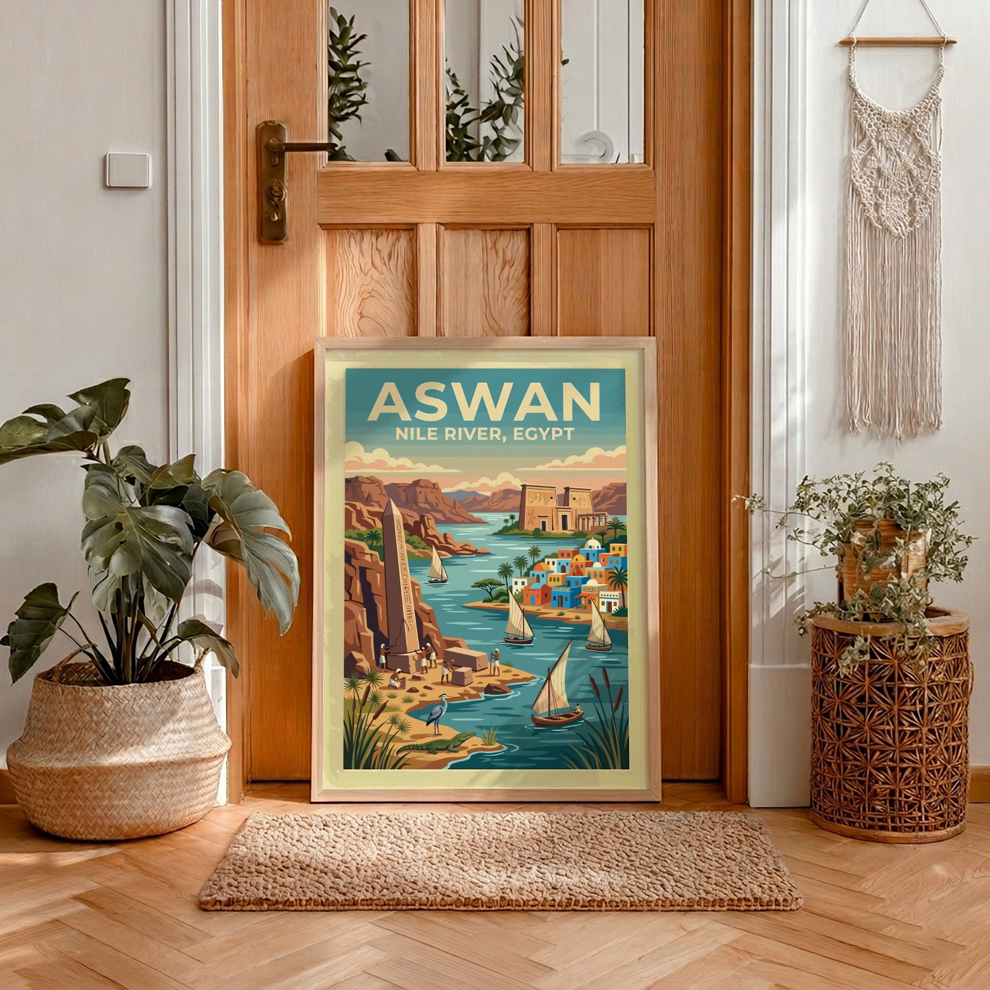 Travel poster of Aswan Egypt featuring the Nile River, ancient obelisks, and sailboats.