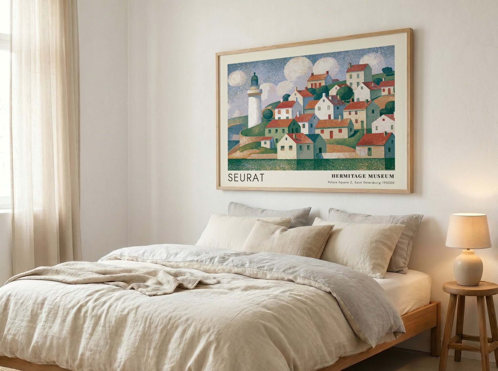 Wall art poster featuring a Seurat coastal village scene with a lighthouse and clouds.