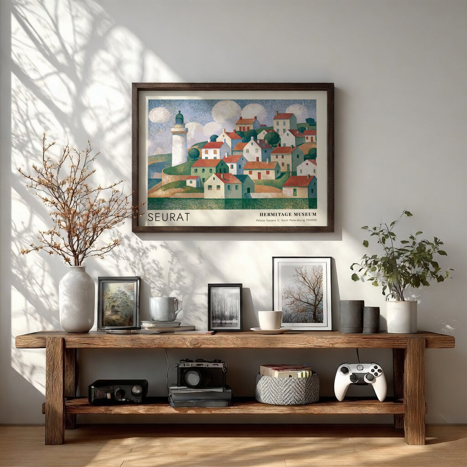 Wall art poster featuring a Seurat coastal village scene with a lighthouse and clouds.
