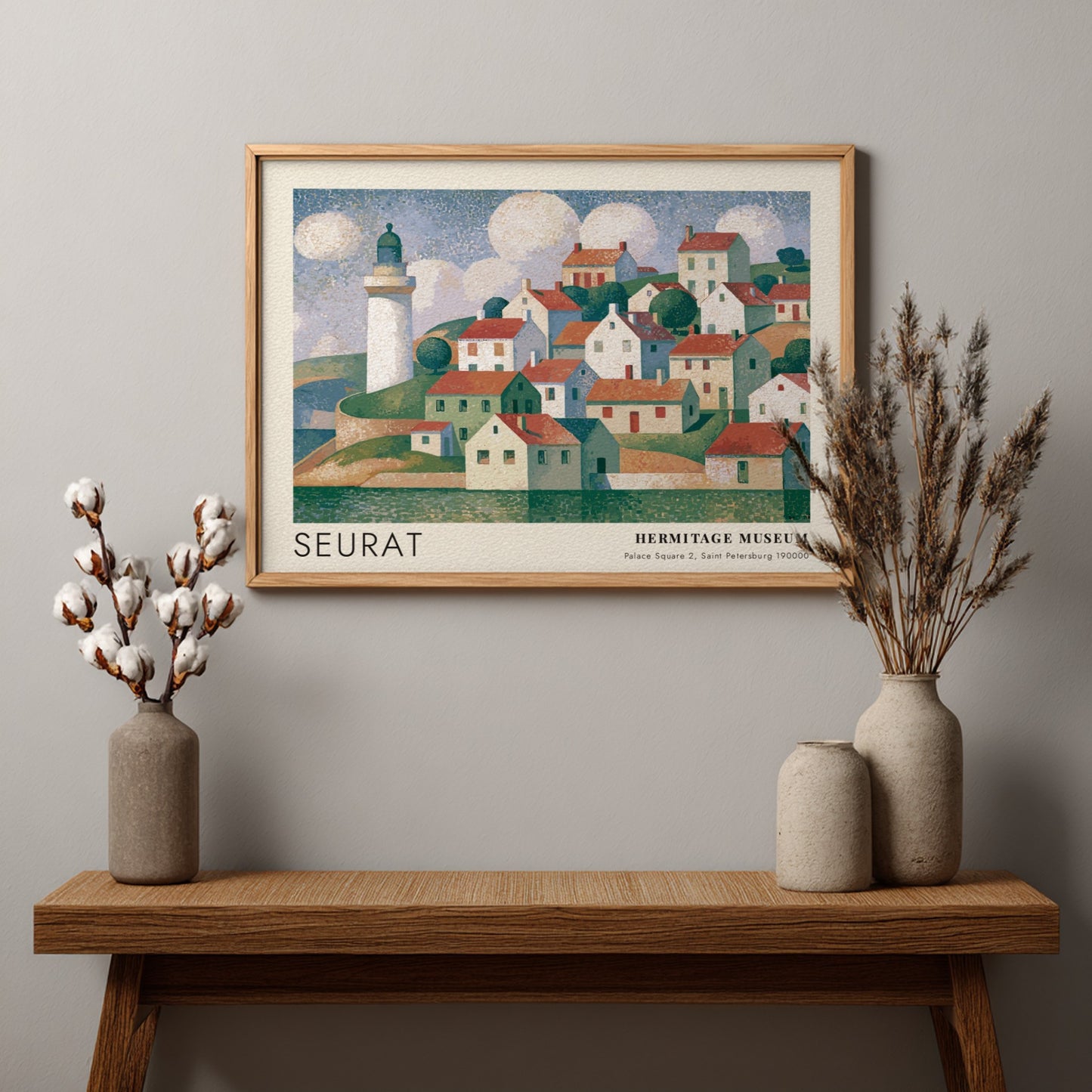 Wall art poster featuring a Seurat coastal village scene with a lighthouse and clouds.