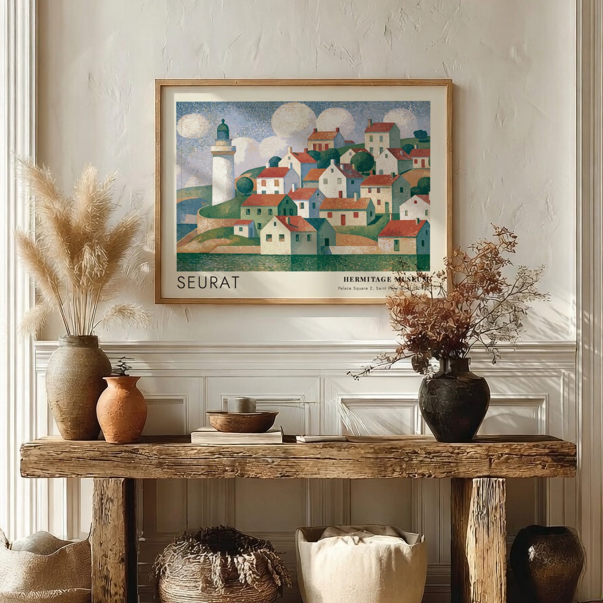 Wall art poster featuring a Seurat coastal village scene with a lighthouse and clouds.