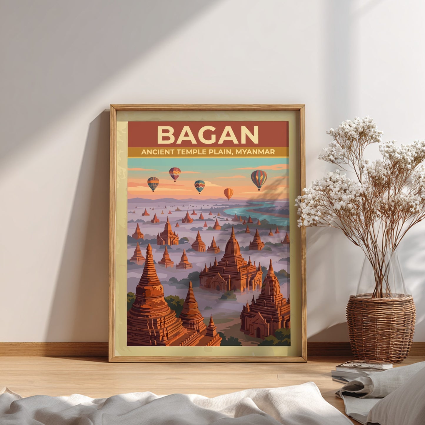 Travel poster of Bagan Ancient Temple Plain in Myanmar with balloons over pagodas.