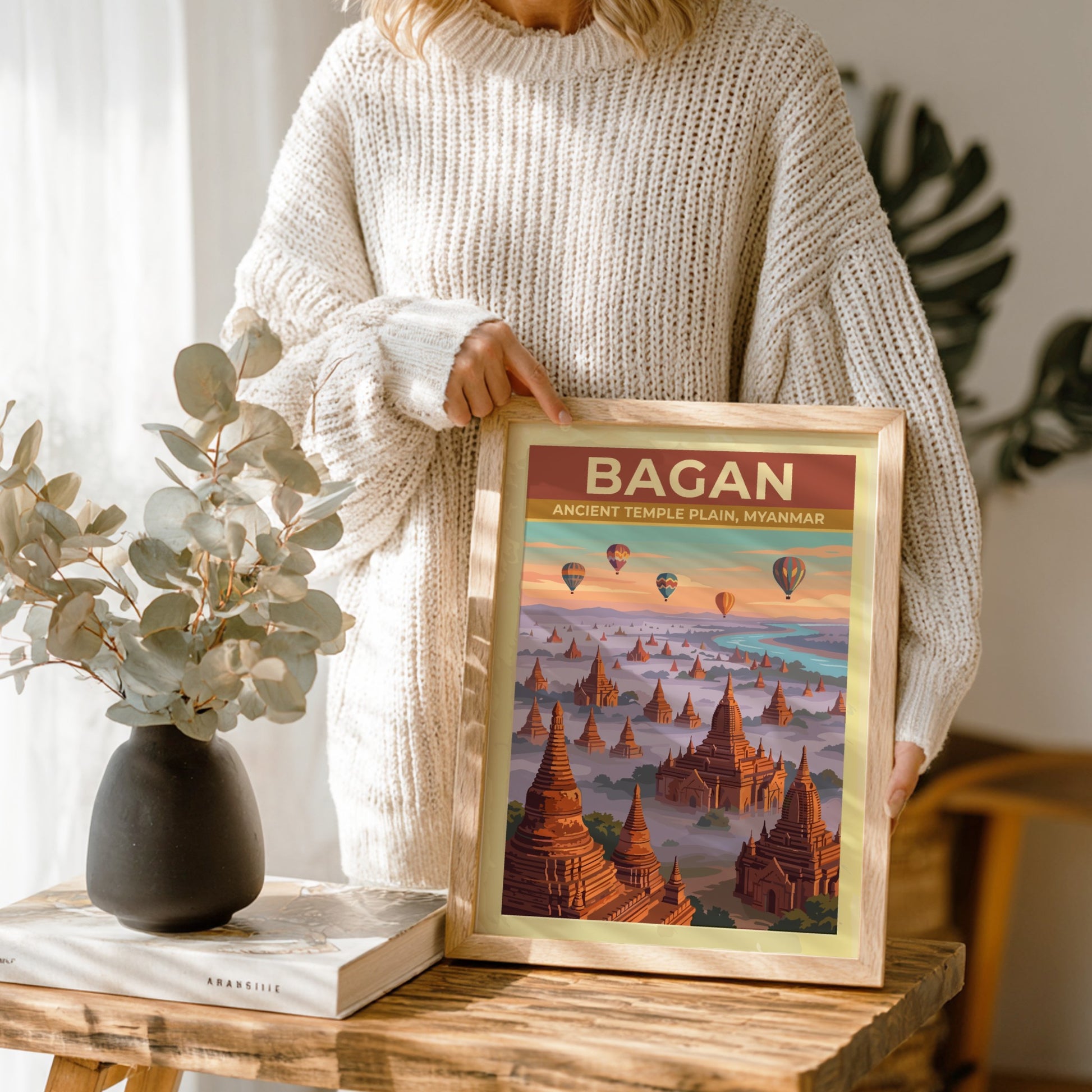 Travel poster of Bagan Ancient Temple Plain in Myanmar with balloons over pagodas.