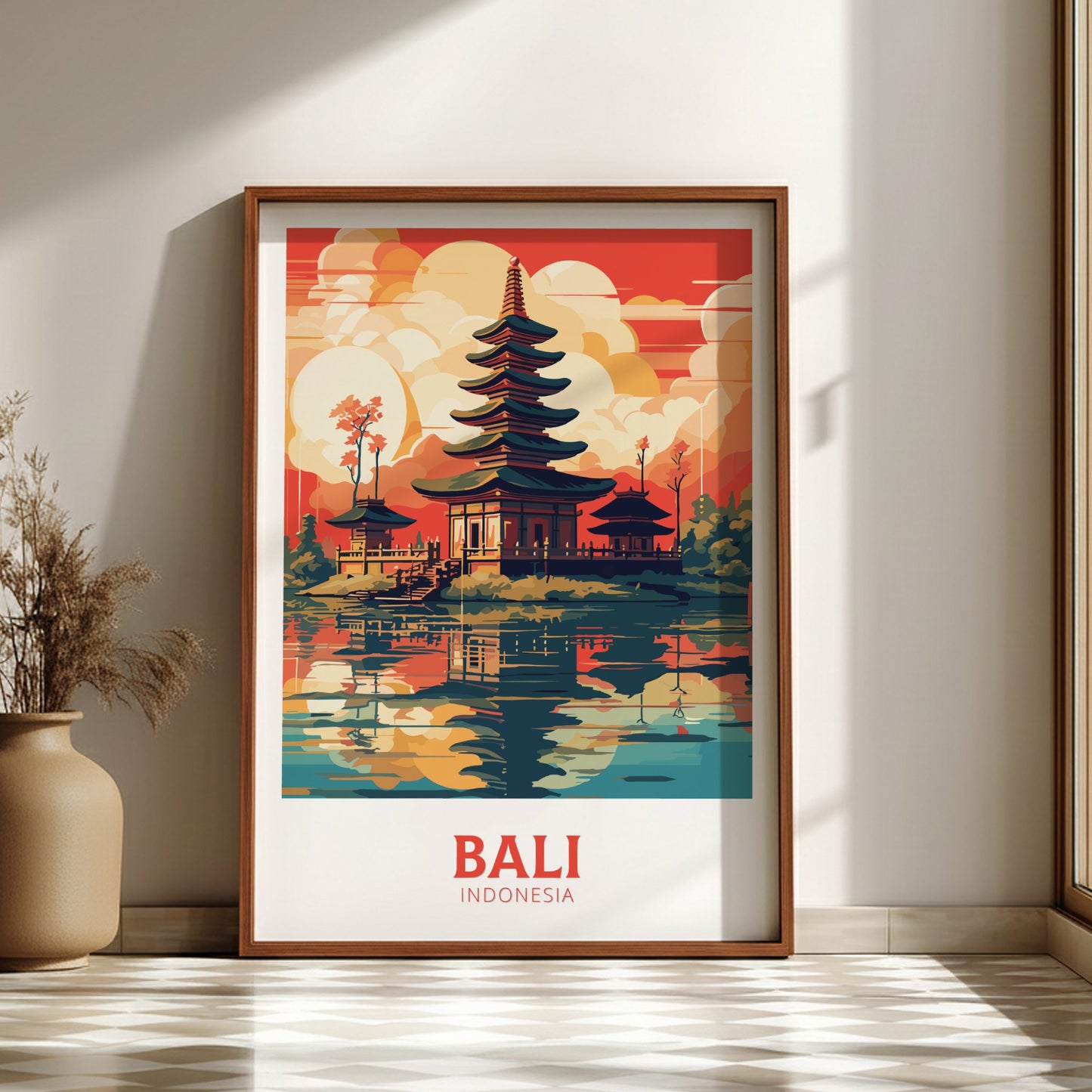Framed poster of Bali, Indonesia with a temple design on a wall.