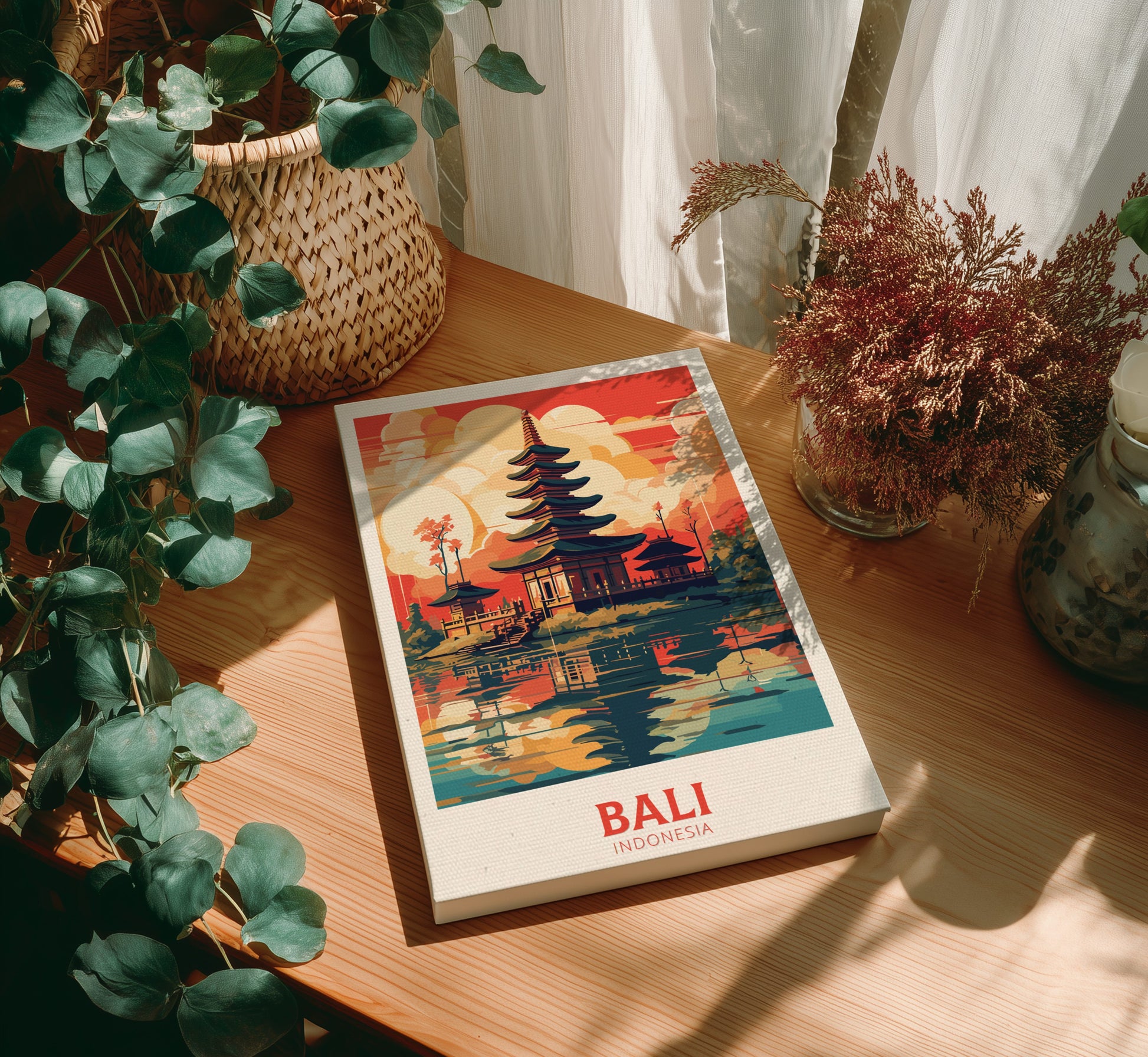 Canvas 'Bali Indonesia' on a wooden table with plants