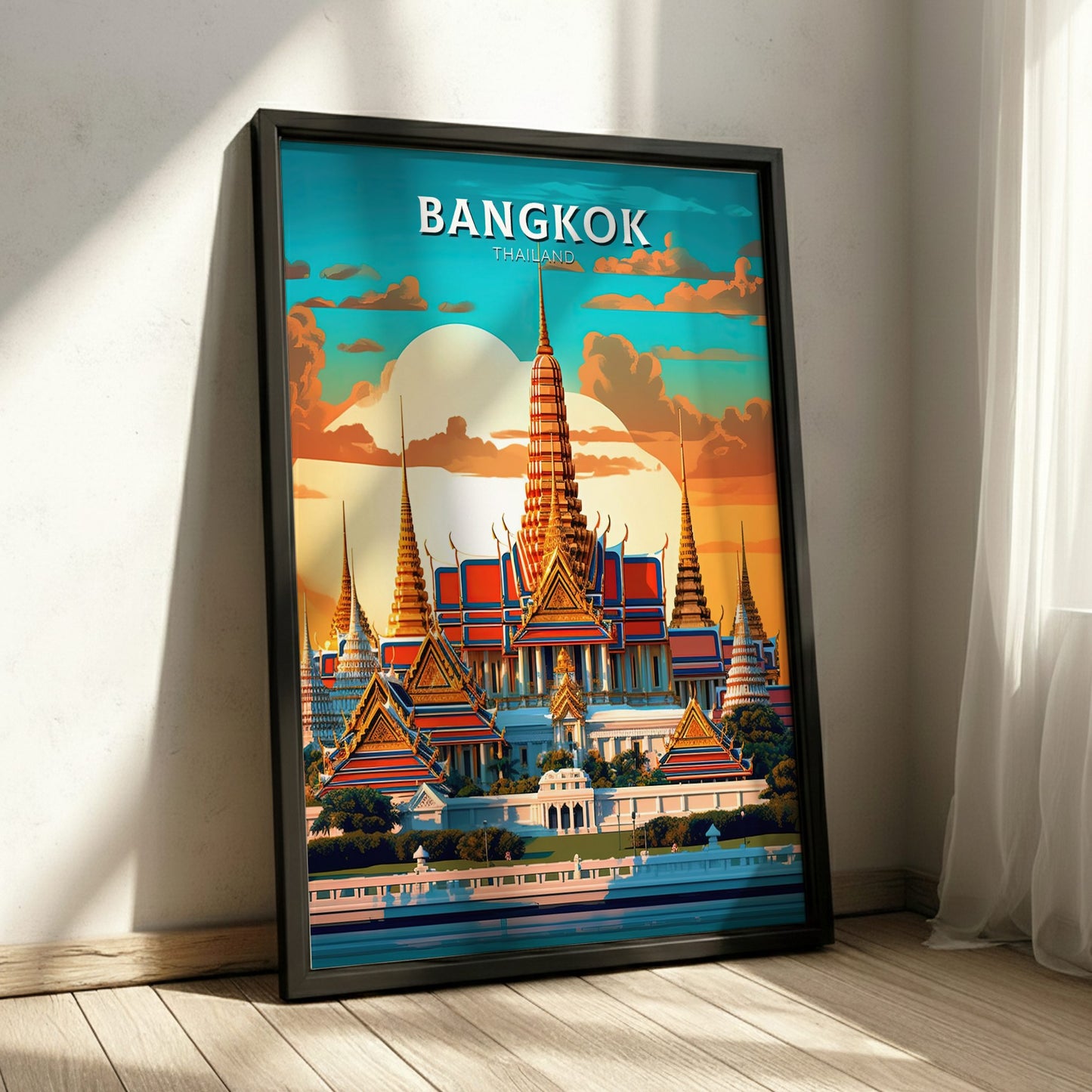 Framed poster of Bangkok with a temple design on a wooden floor.