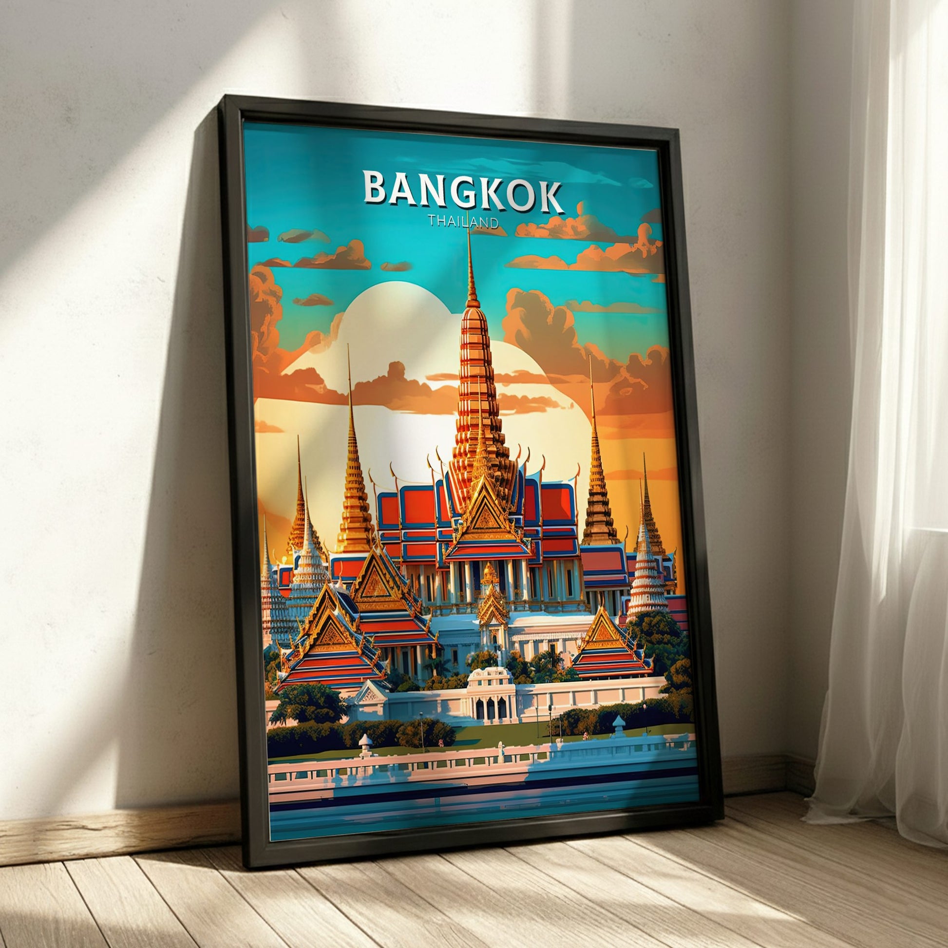 Framed poster of Bangkok with a temple design on a wooden floor.