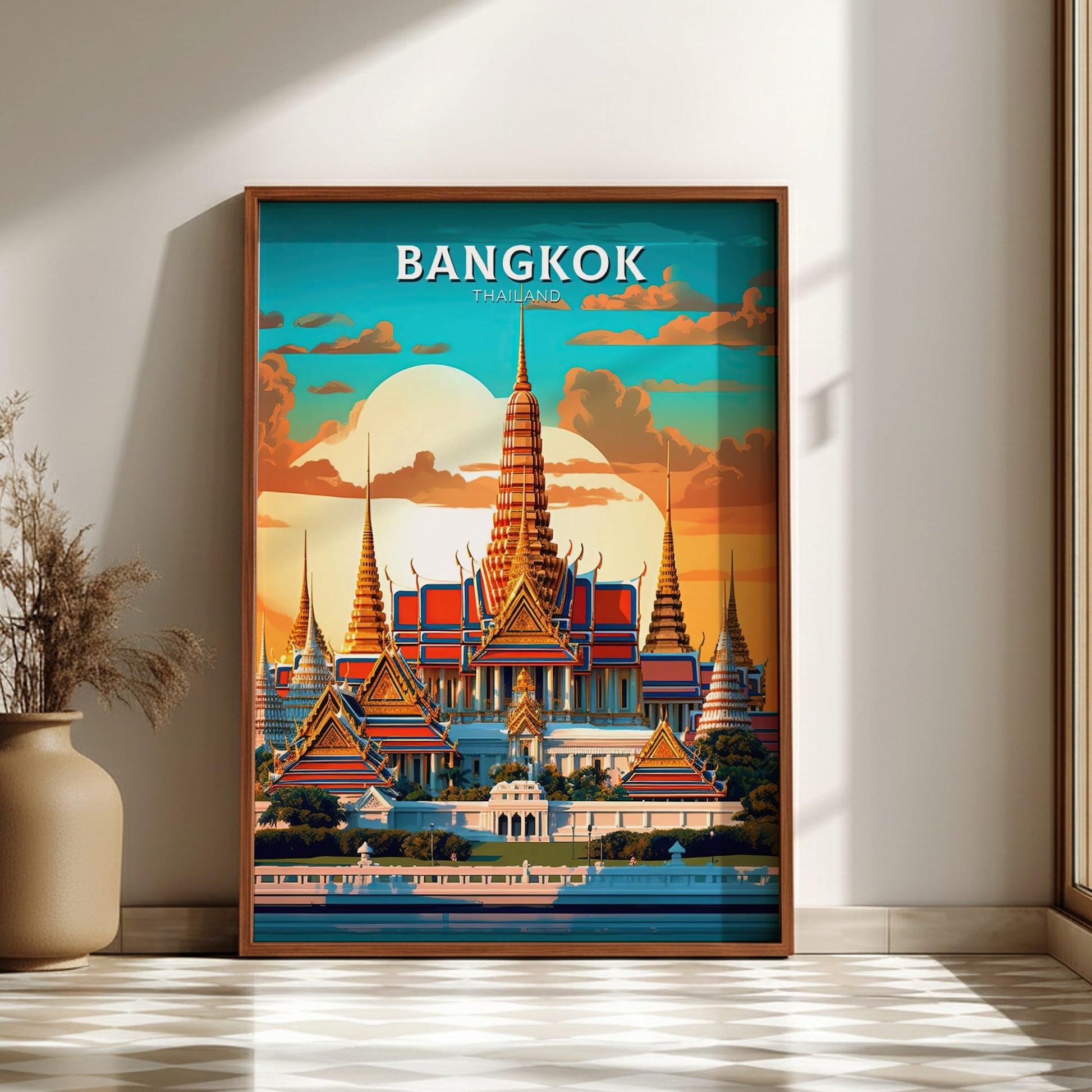 Framed poster of Bangkok with a temple design on a wall.