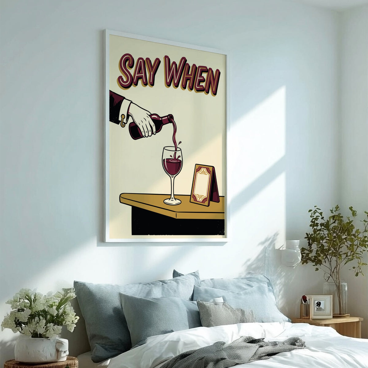 Poster featuring a hand pouring red wine into a glass with Say When text.