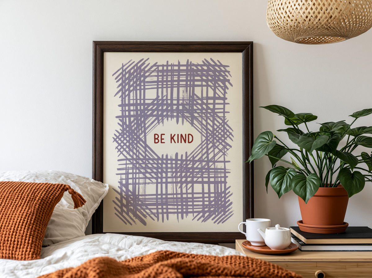 Motivational poster with Be Kind text centered over a soft lavender crosshatch pattern.