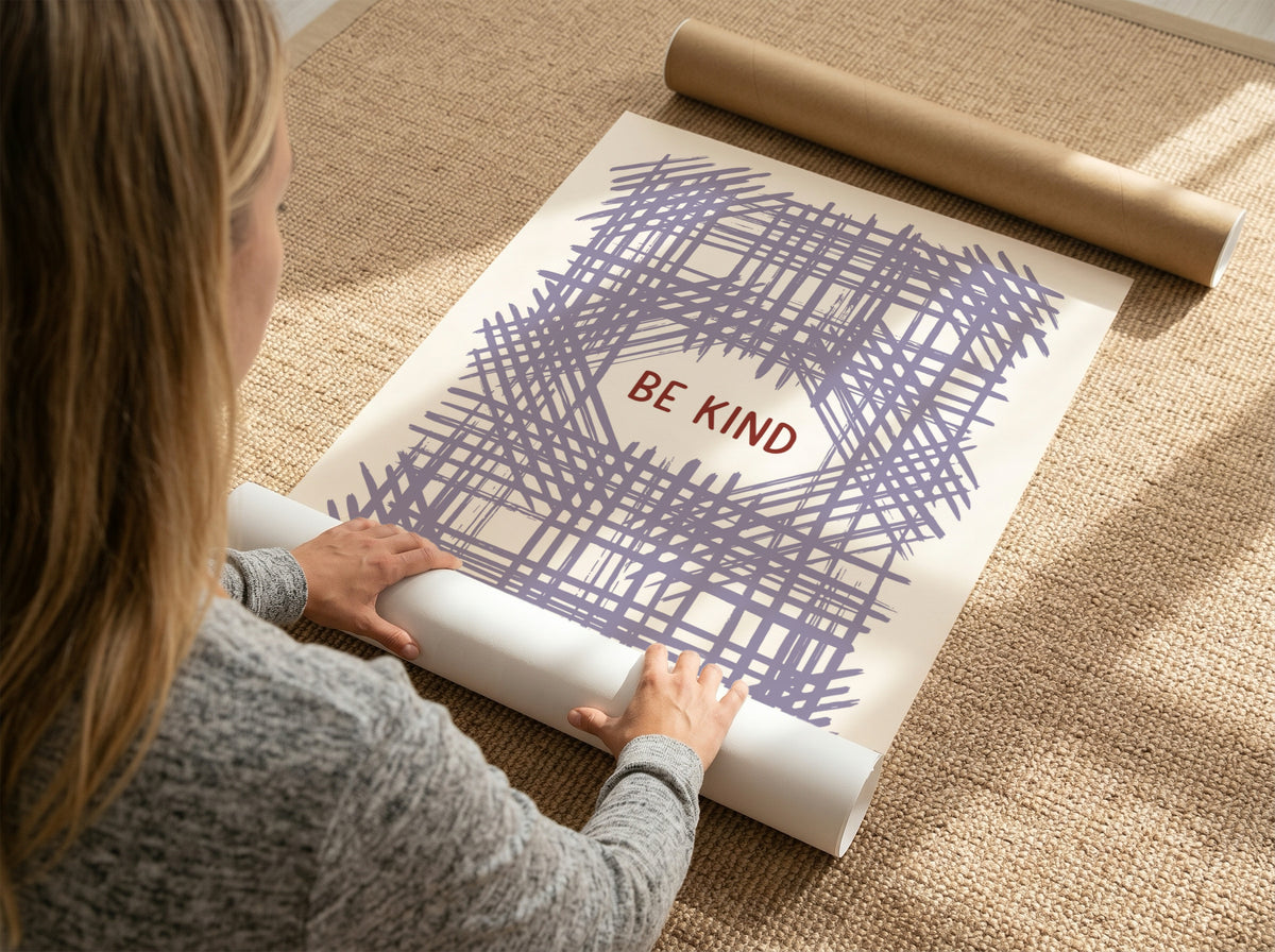 Motivational poster with Be Kind text centered over a soft lavender crosshatch pattern.