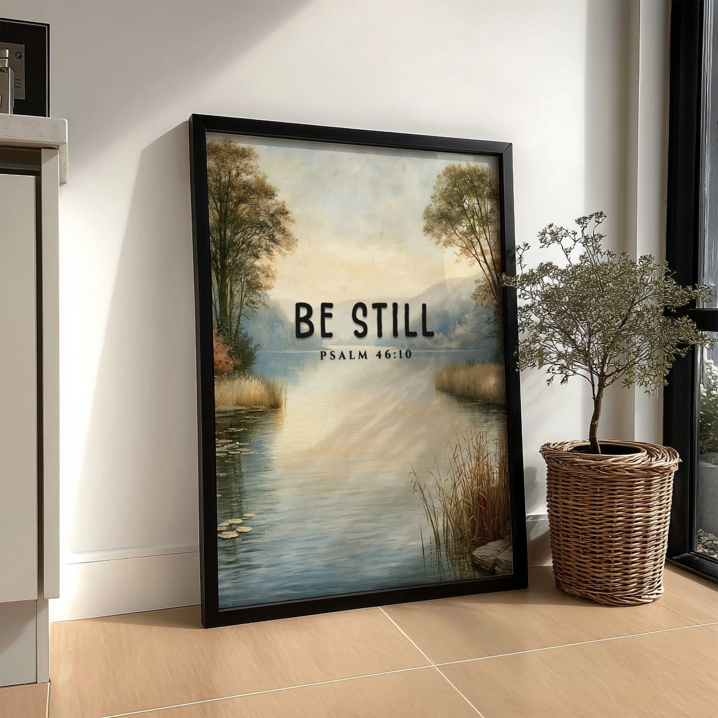 Be Still poster featuring serene landscape and Psalm 46:10, inspirational wall art in soft blue and earthy