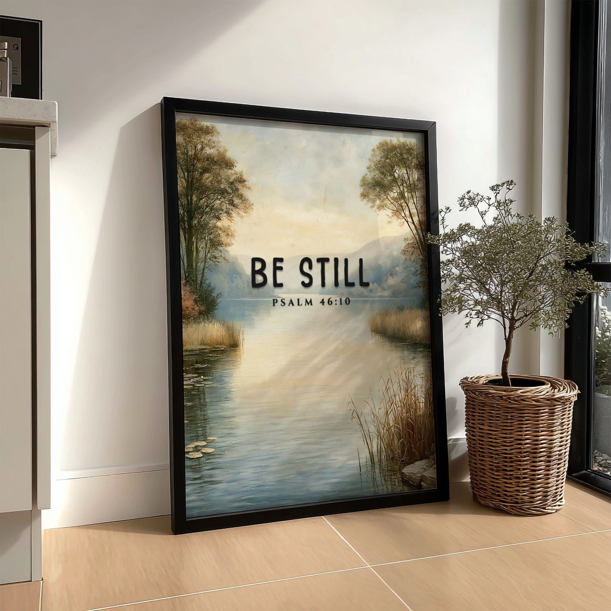 Be Still poster featuring serene landscape and Psalm 46:10, inspirational wall art in soft blue and earthy