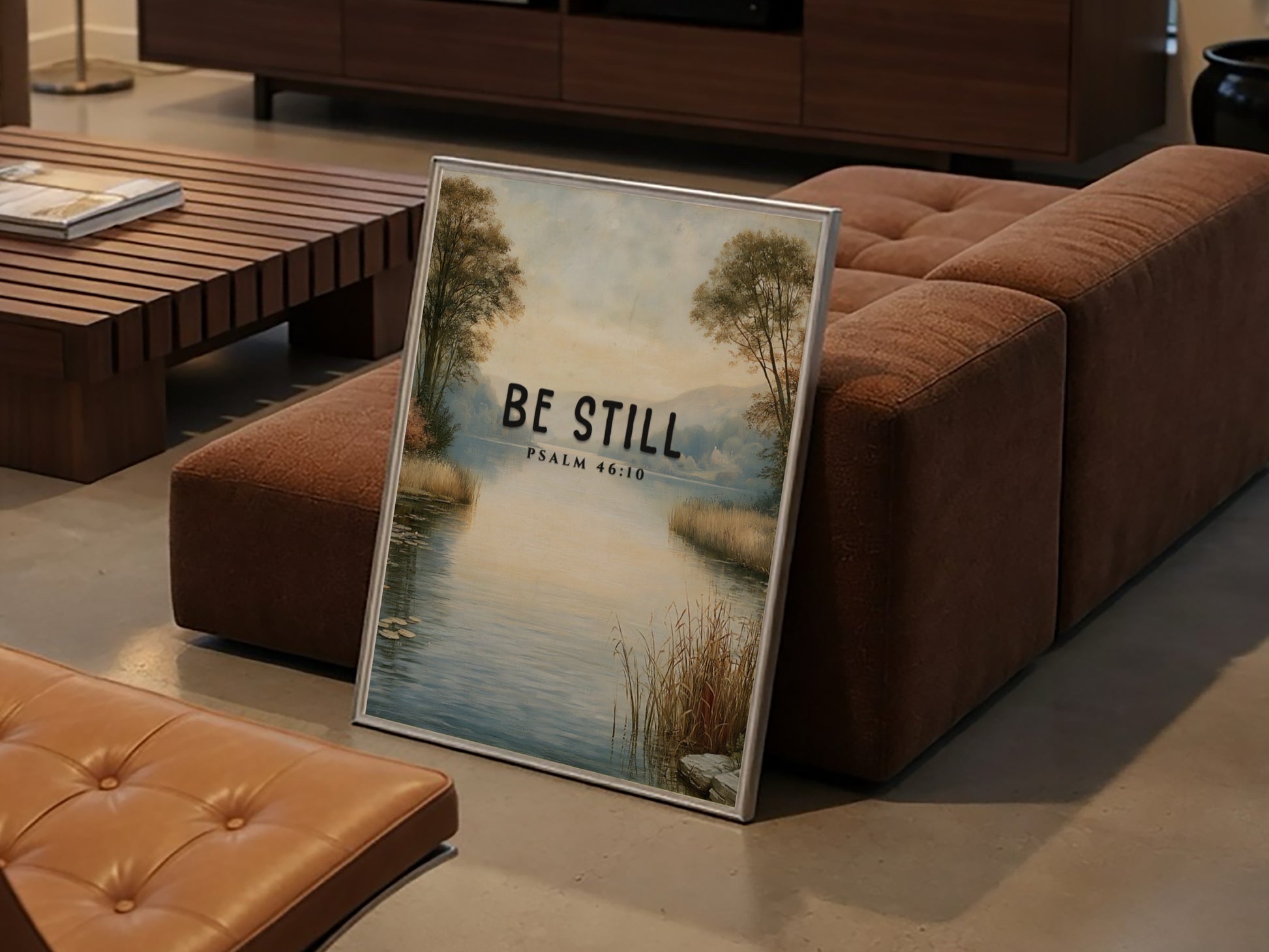 Be Still poster featuring serene landscape and Psalm 46:10, inspirational wall art in soft blue and earthy