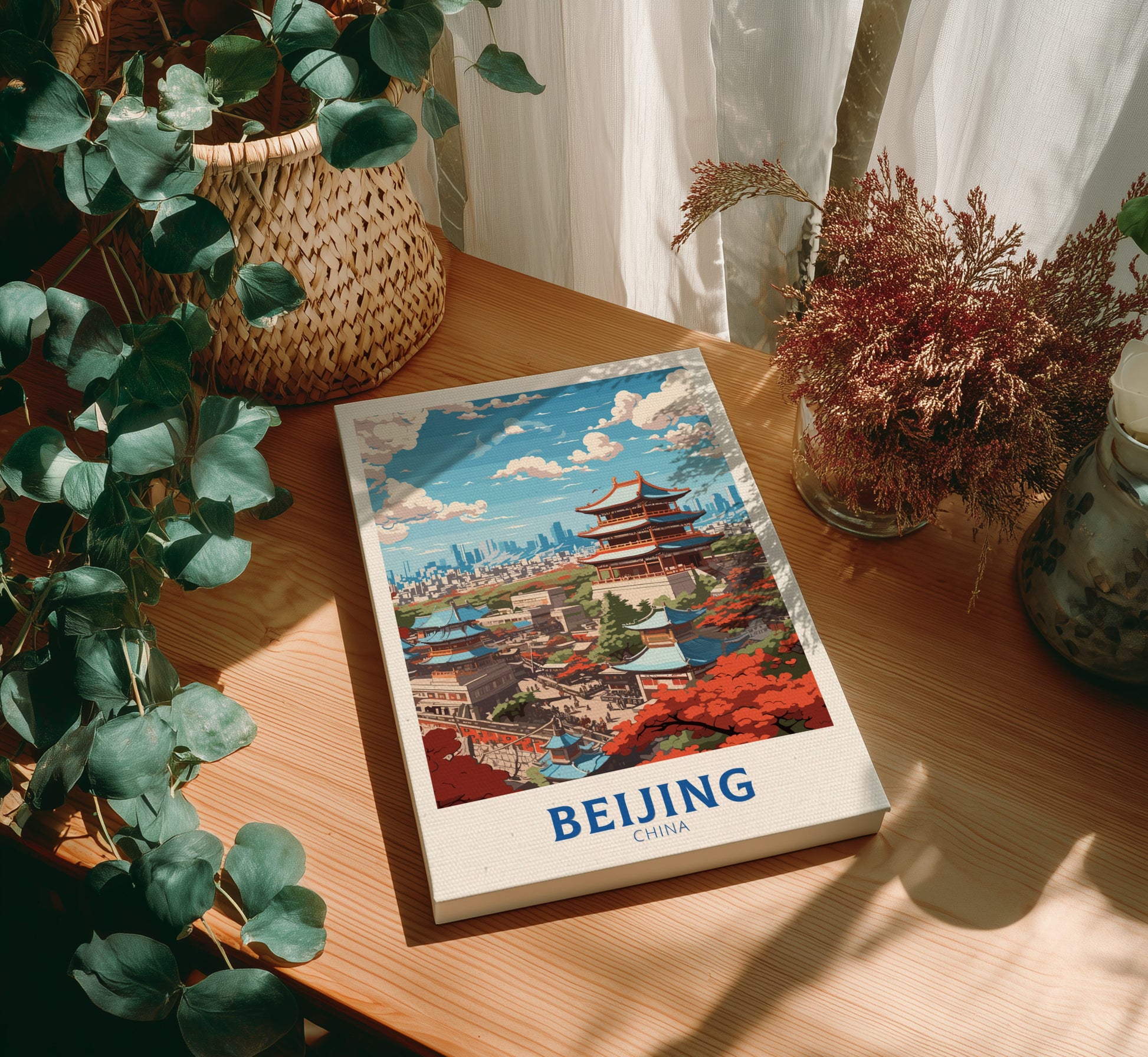 Canvas with a Beijing illustration on a wooden table with plants
