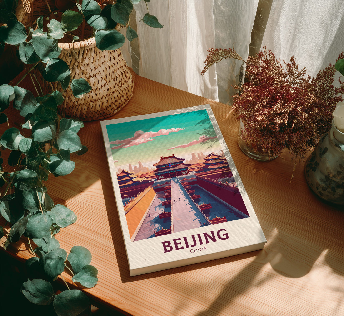Canvas with a Beijing-themed cover on a wooden table with plants