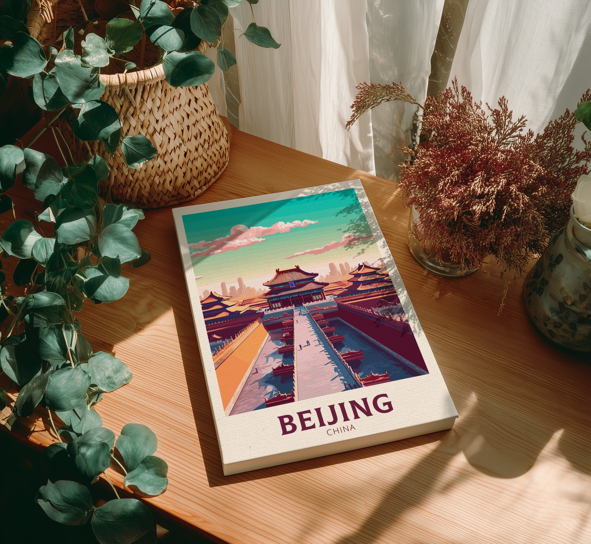 Canvas with a Beijing-themed cover on a wooden table with plants