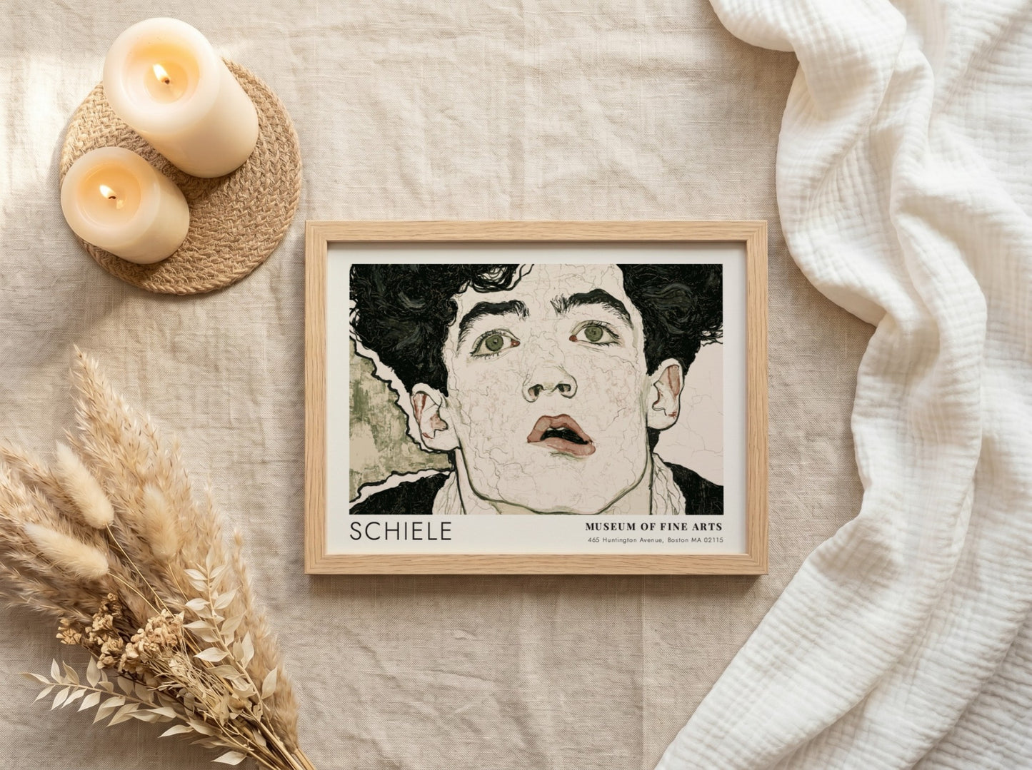 Wall art poster of an Egon Schiele portrait with dark hair and intense eyes.