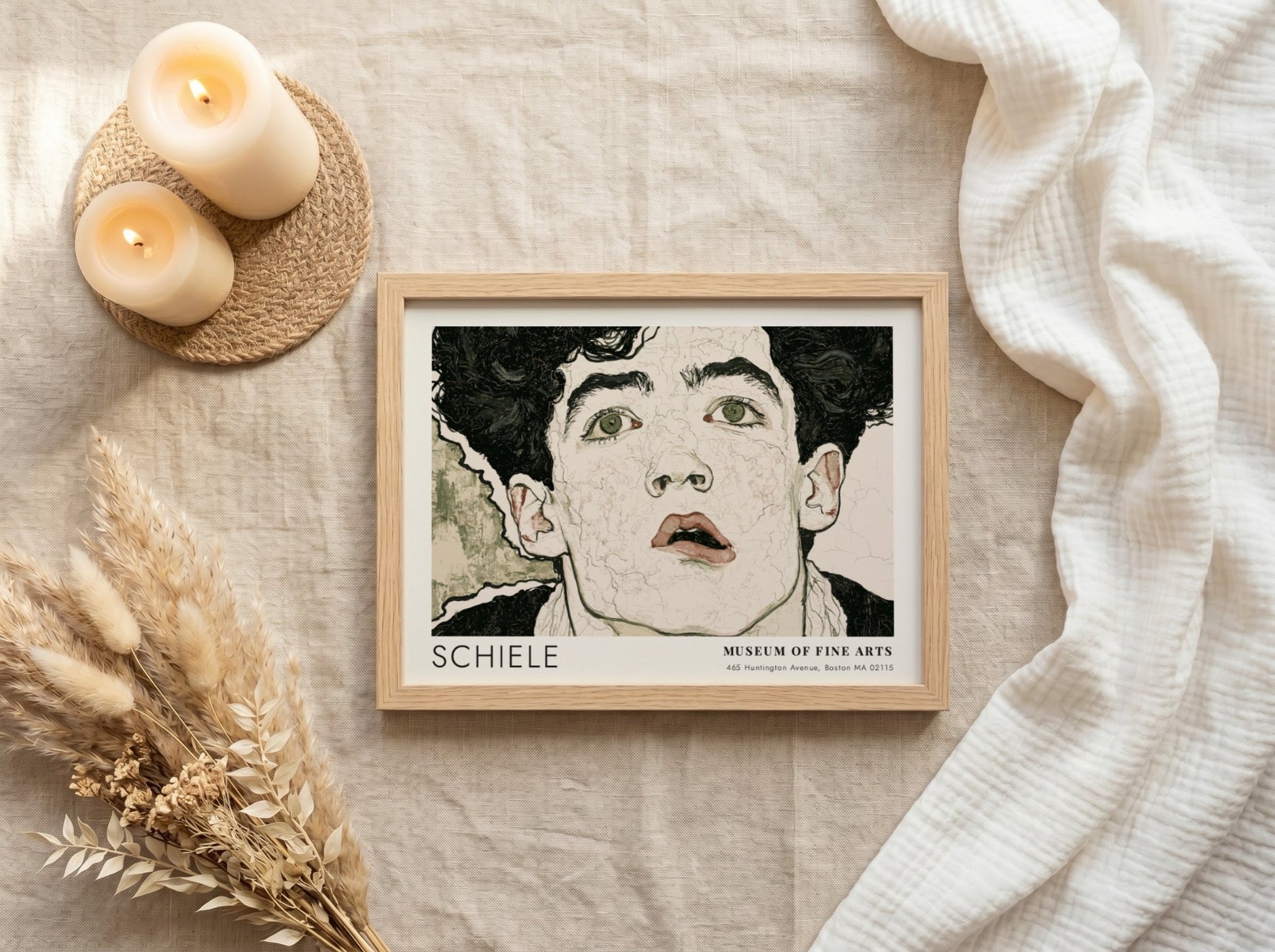 Wall art poster of an Egon Schiele portrait with dark hair and intense eyes.