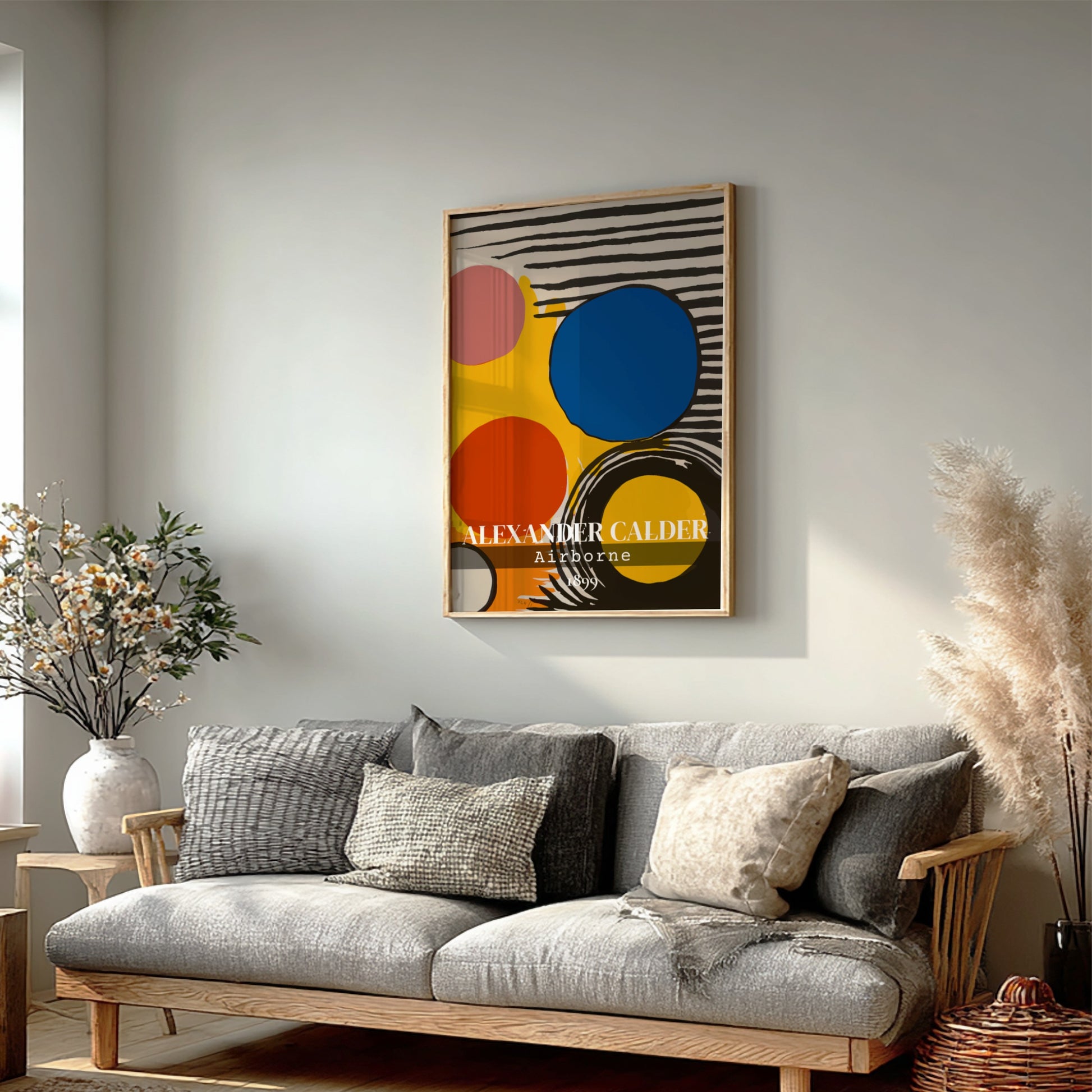Poster of Alexander Calder's "Airborne" abstract art with red, blue, pink circles and black stripes.