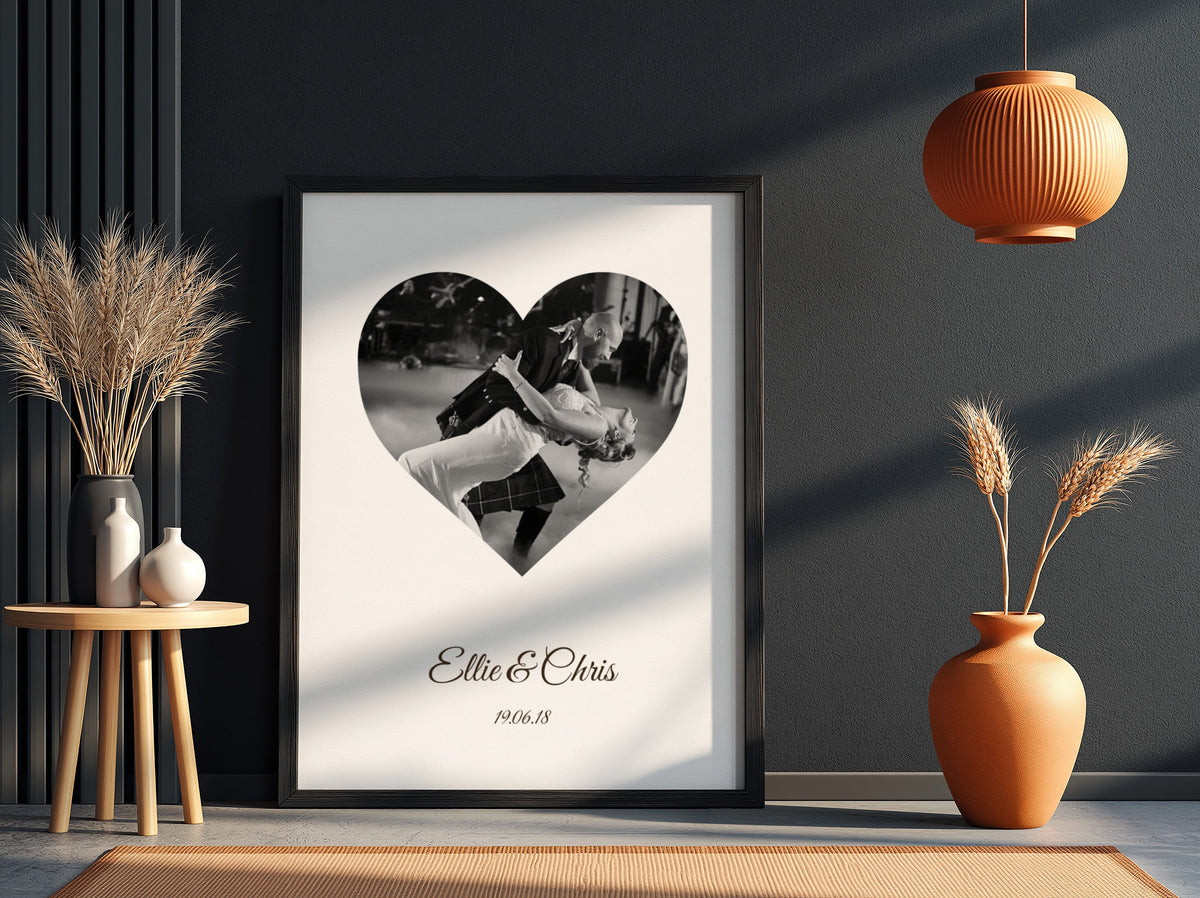 Personalised Heart Photo Poster in a black frame on a dark wall