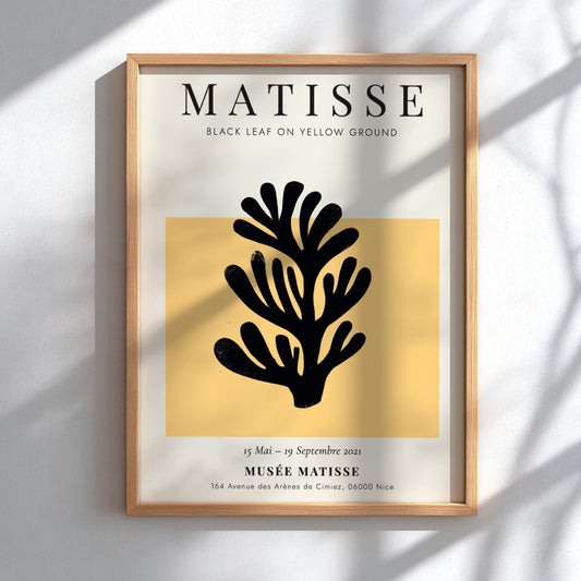 Henri Matisse Black Leaf poster featuring bold black silhouette on yellow background, ideal for home decor.