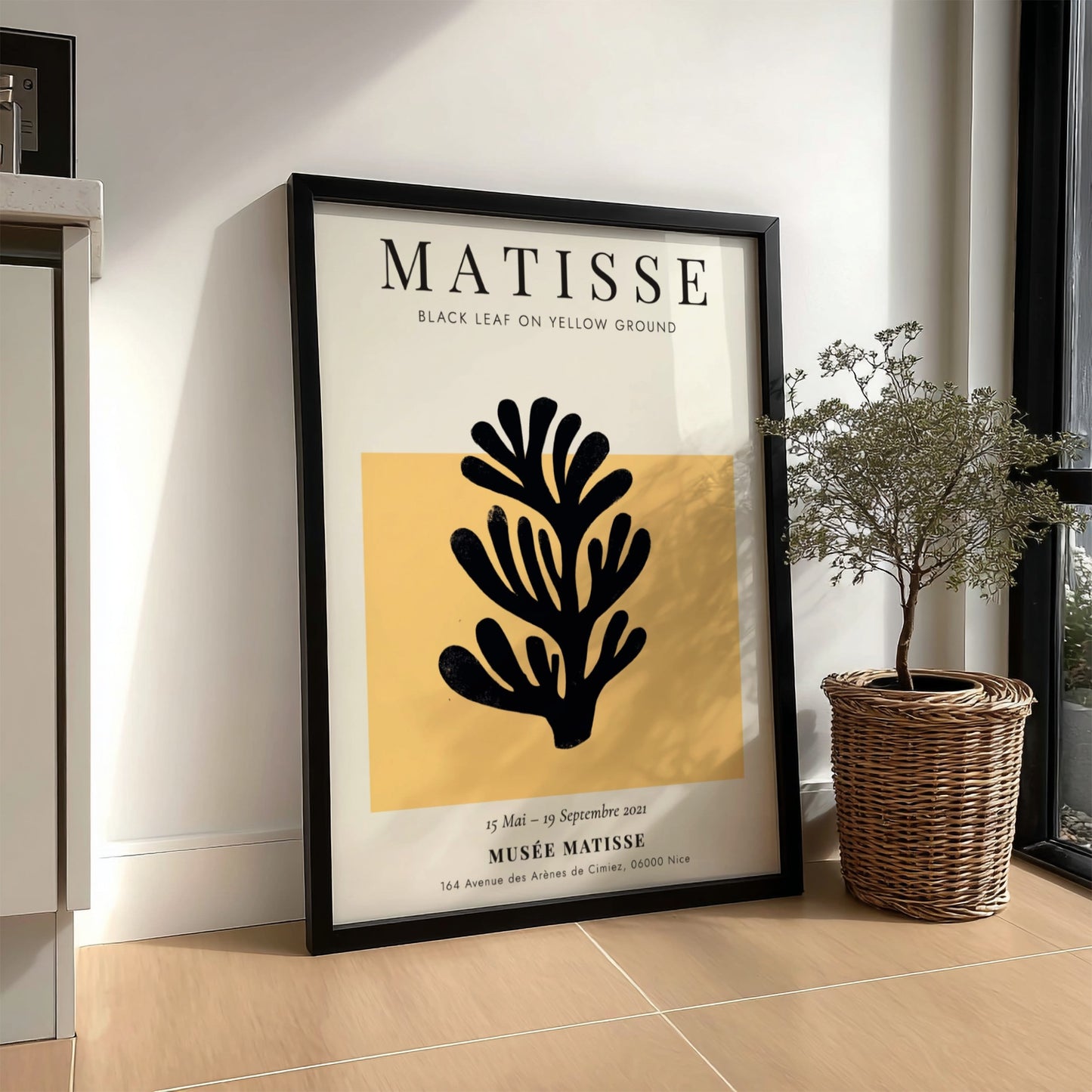 Henri Matisse Black Leaf poster featuring bold black silhouette on yellow background, ideal for home decor.