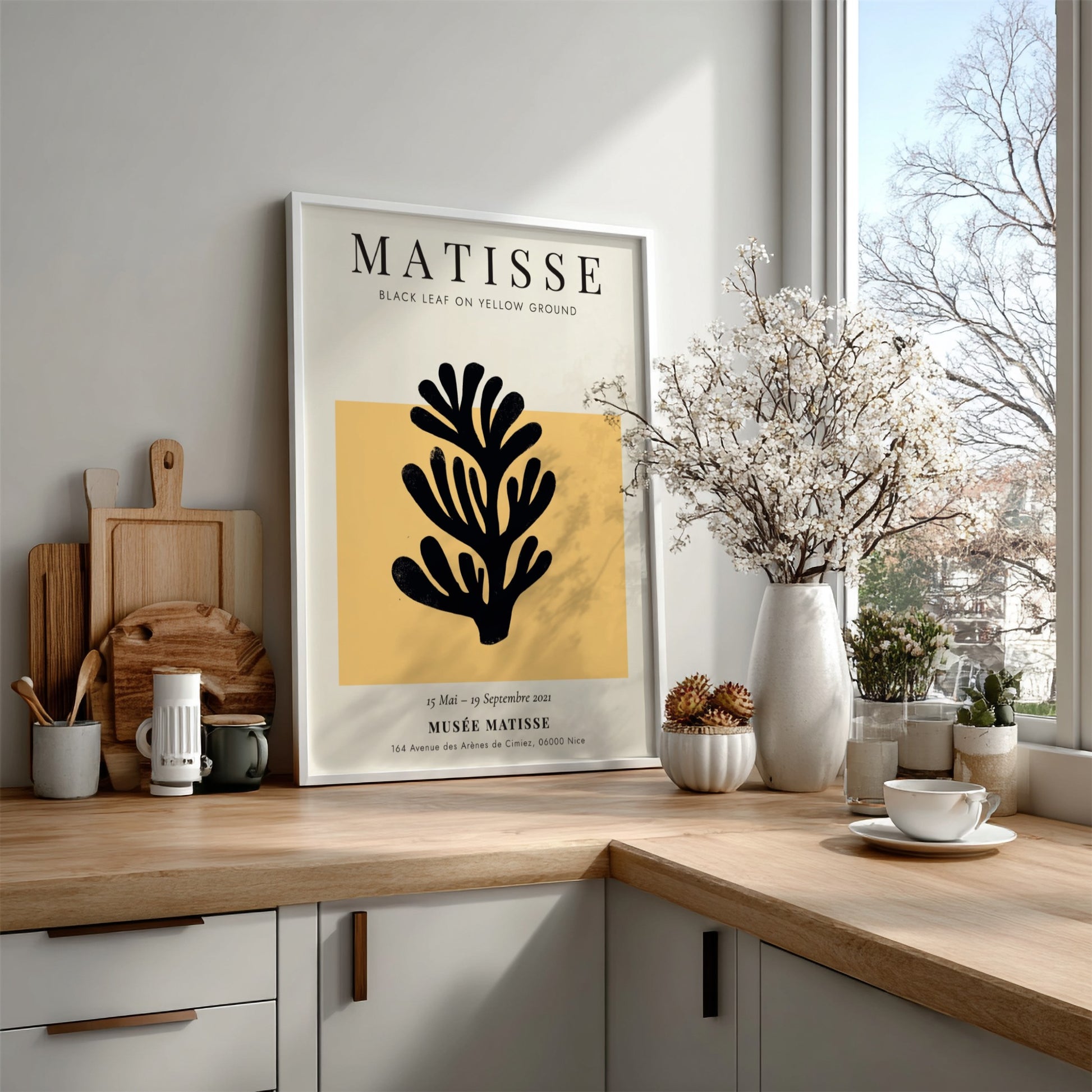 Henri Matisse Black Leaf poster featuring bold black silhouette on yellow background, ideal for home decor.