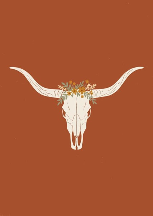 Poster featuring a white bull skull with a wildflower crown on terracotta background