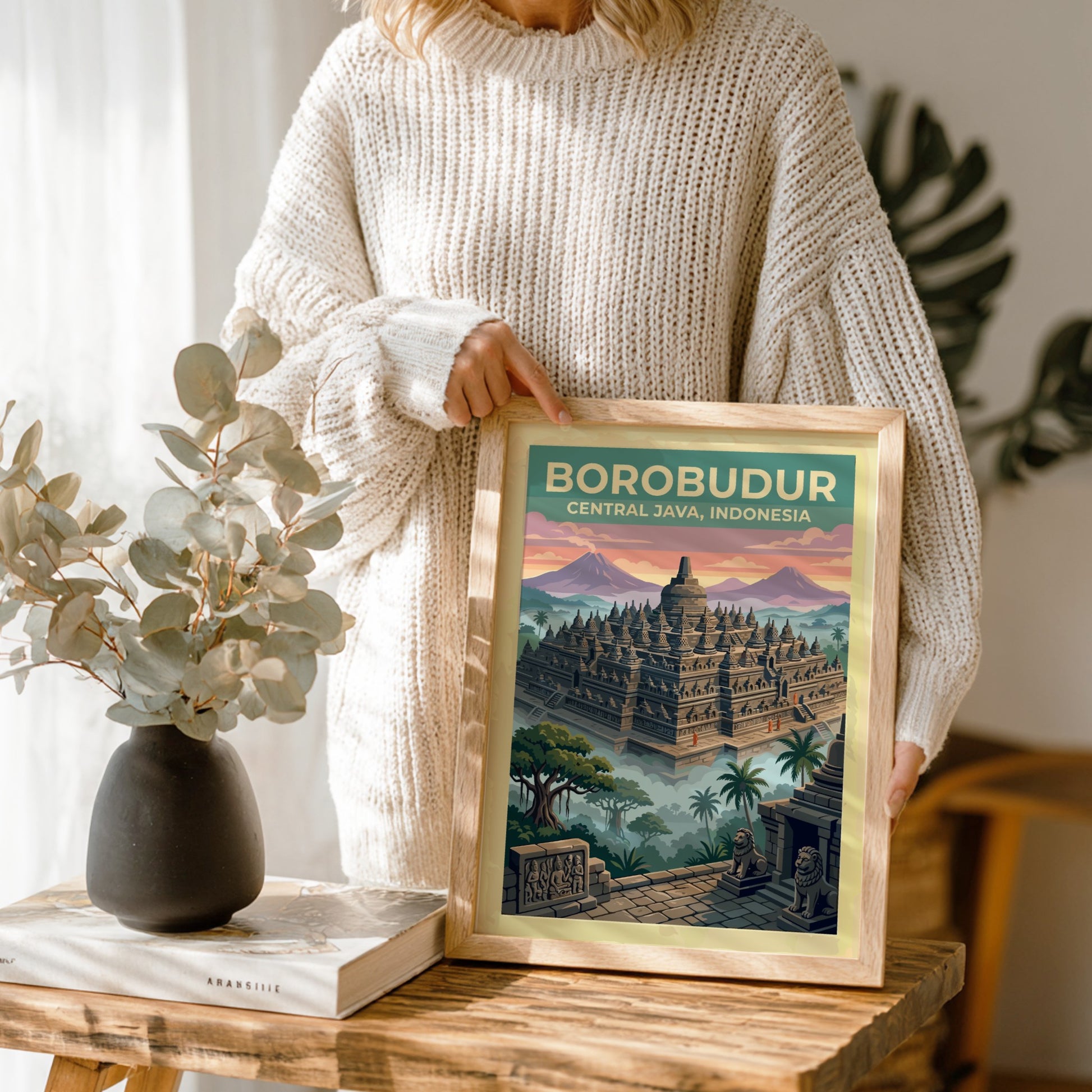Travel poster of Borobudur temple in Central Java Indonesia with misty jungle trees