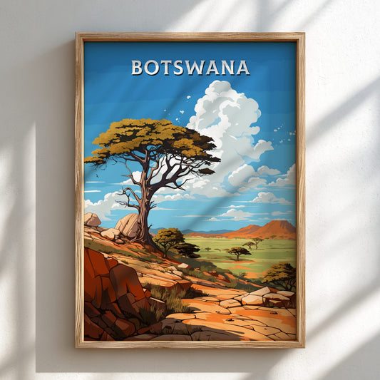 Framed artwork of a landscape with 'BOTSWANA' text on a blue sky background.