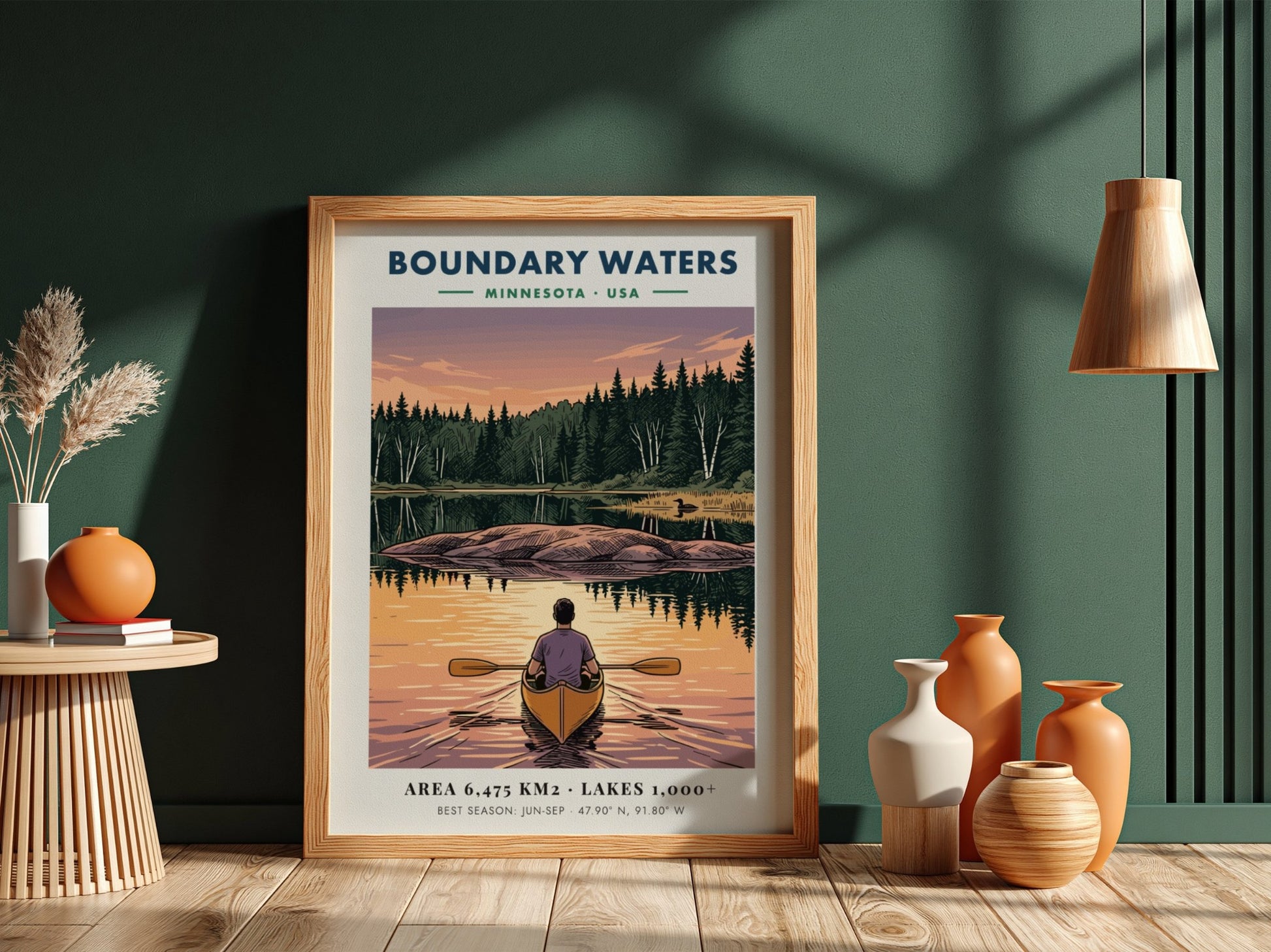 Poster of a lone kayaker paddling toward an island on Boundary Waters Minnesota lake.